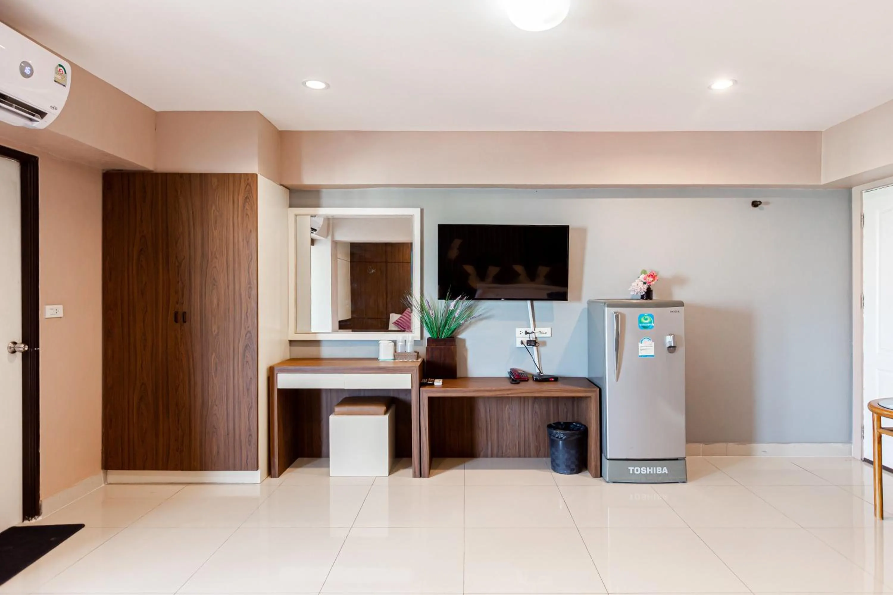 Bedroom in Latin Garden Hotel