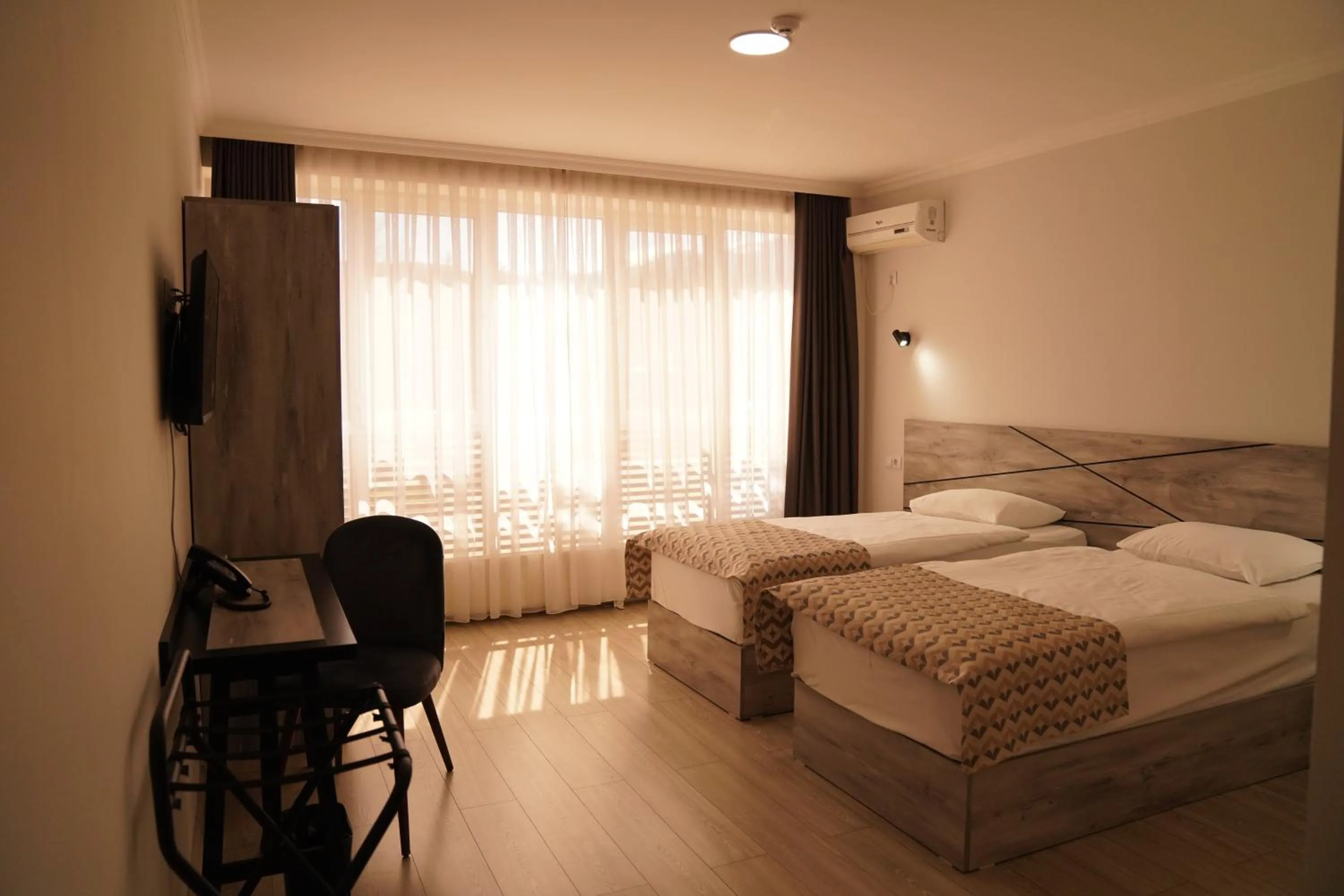 Bed in Aventus Hotel