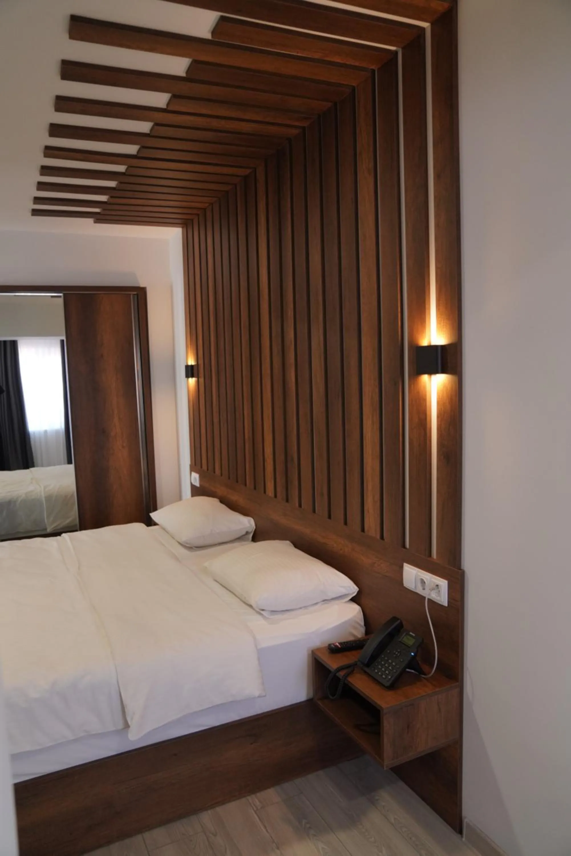Bed in Aventus Hotel