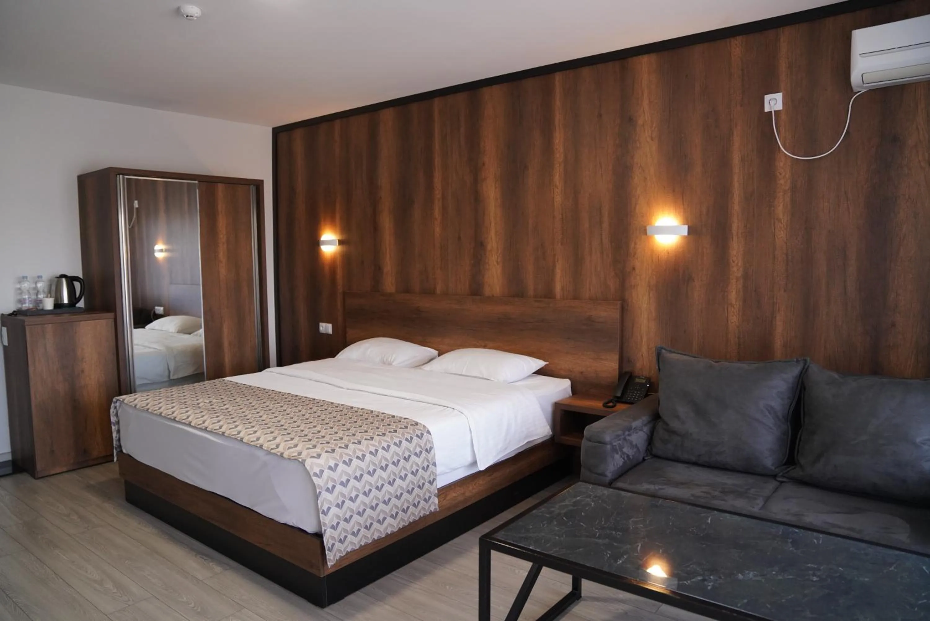 Bed in Aventus Hotel