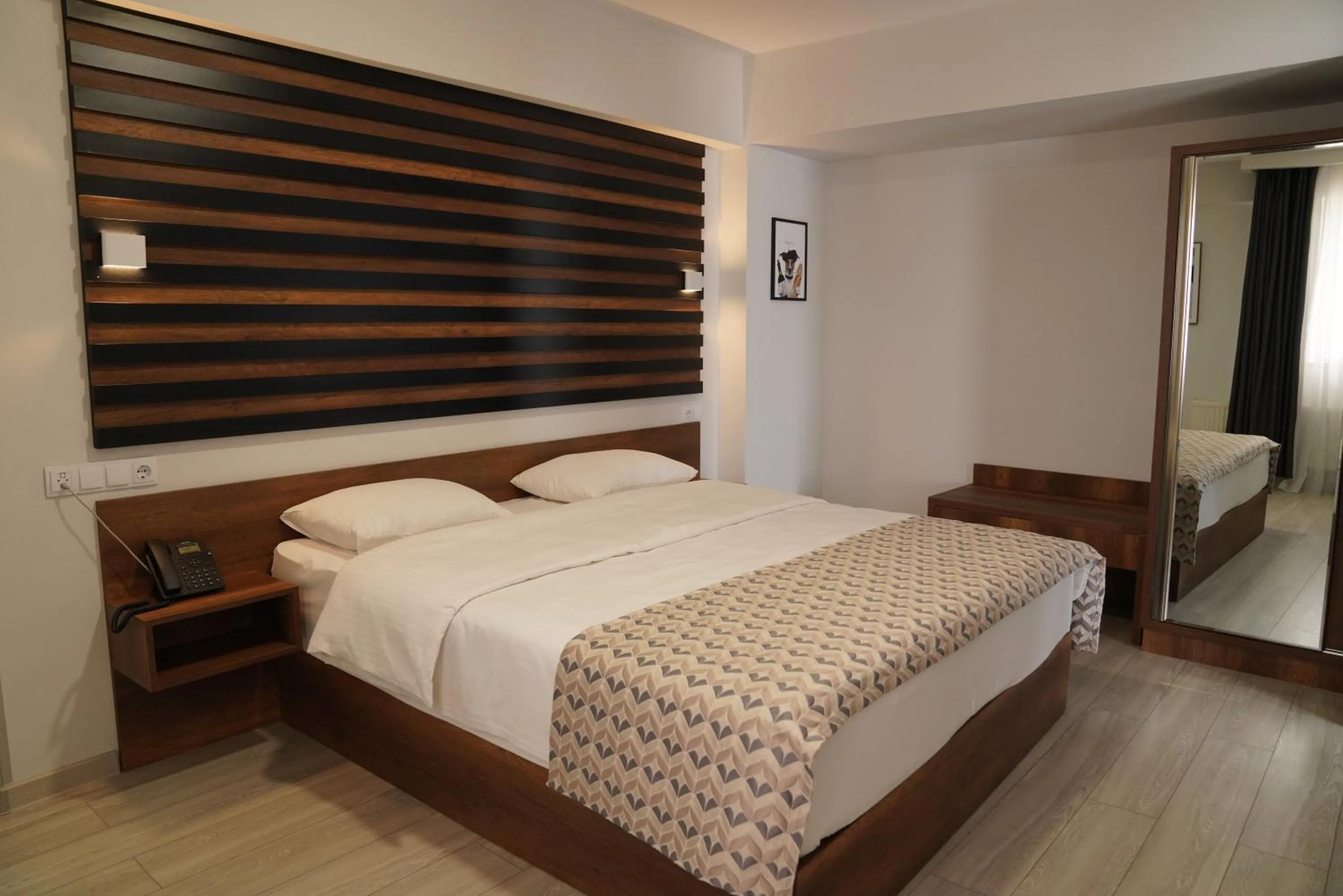Bed in Aventus Hotel