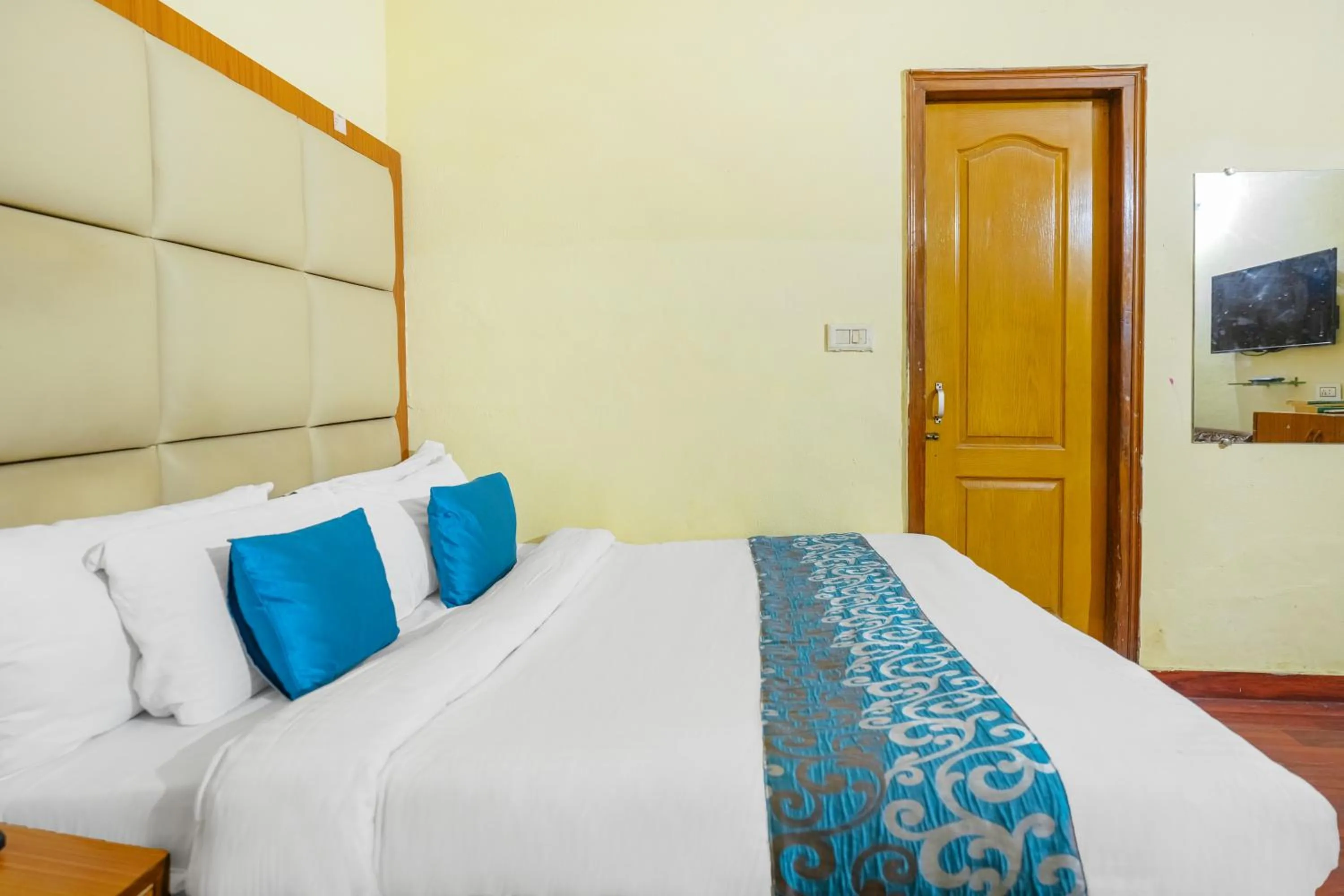 Bed in Hotel Abhi international