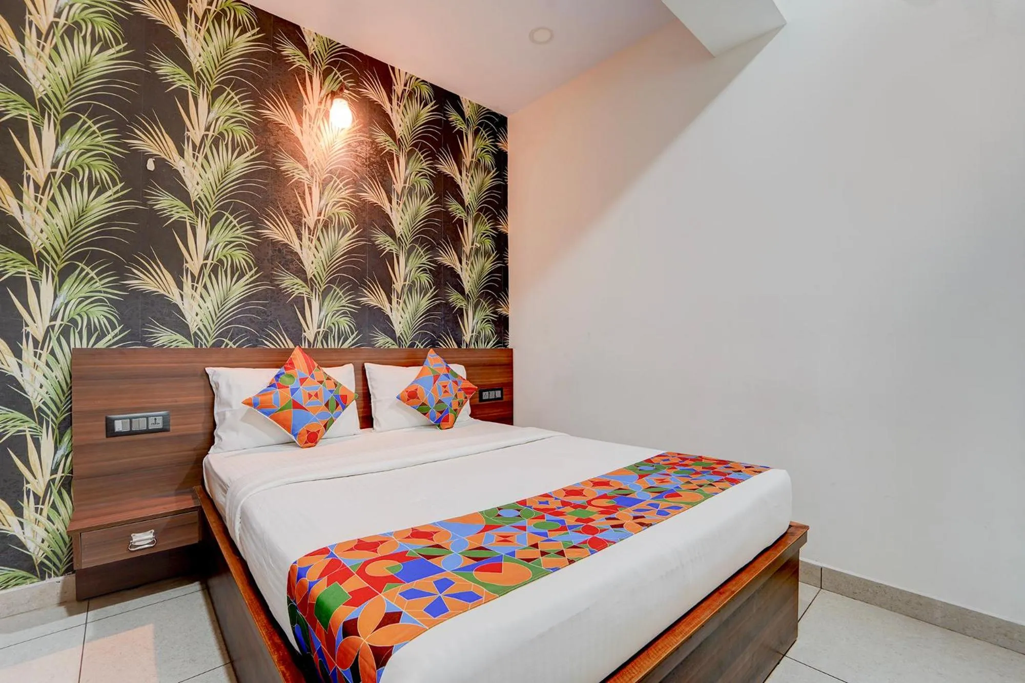 Bed in FabHotel NRM Residency
