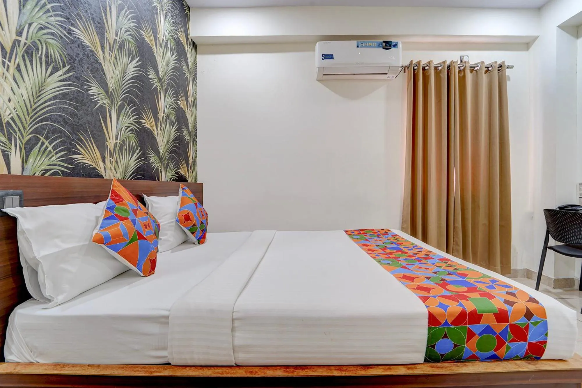 Bed in FabHotel NRM Residency