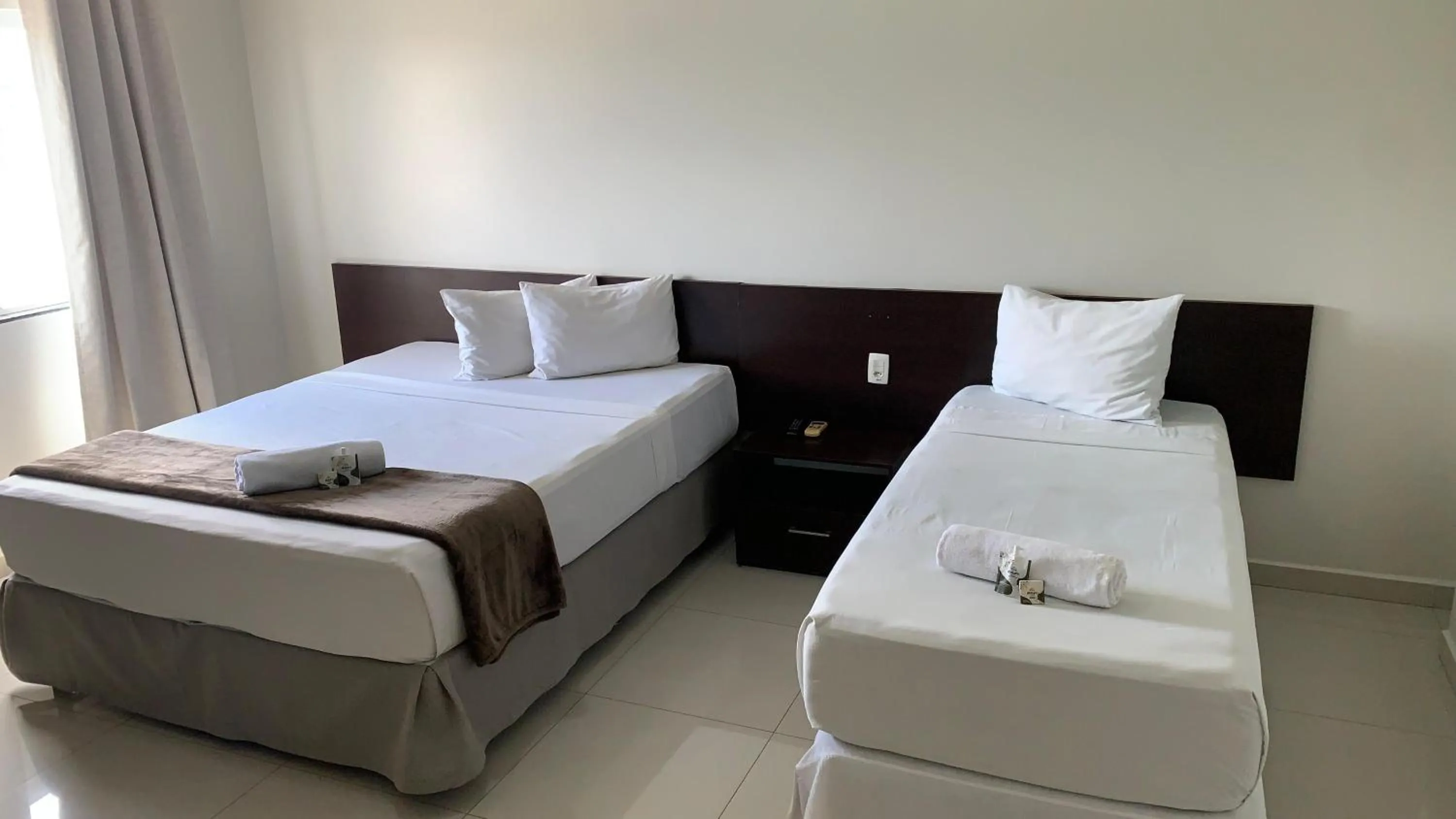 Bed in Atrium Express Hotels