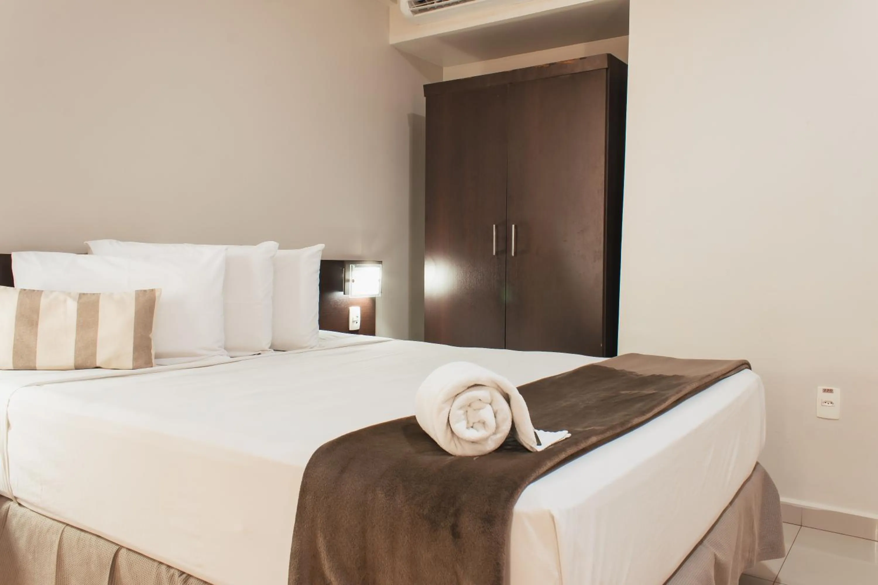 Bed in Atrium Express Hotels