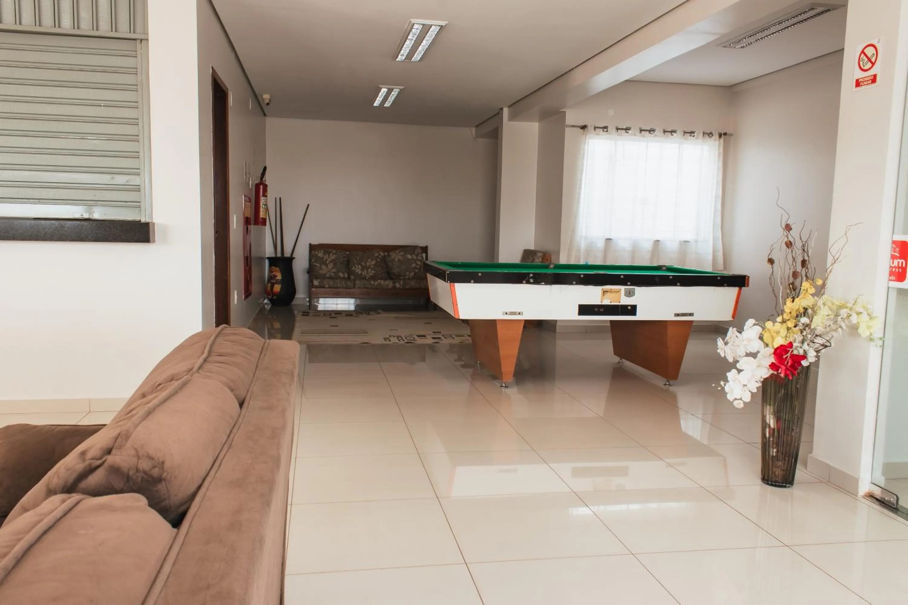 Seating area in Atrium Express Hotels