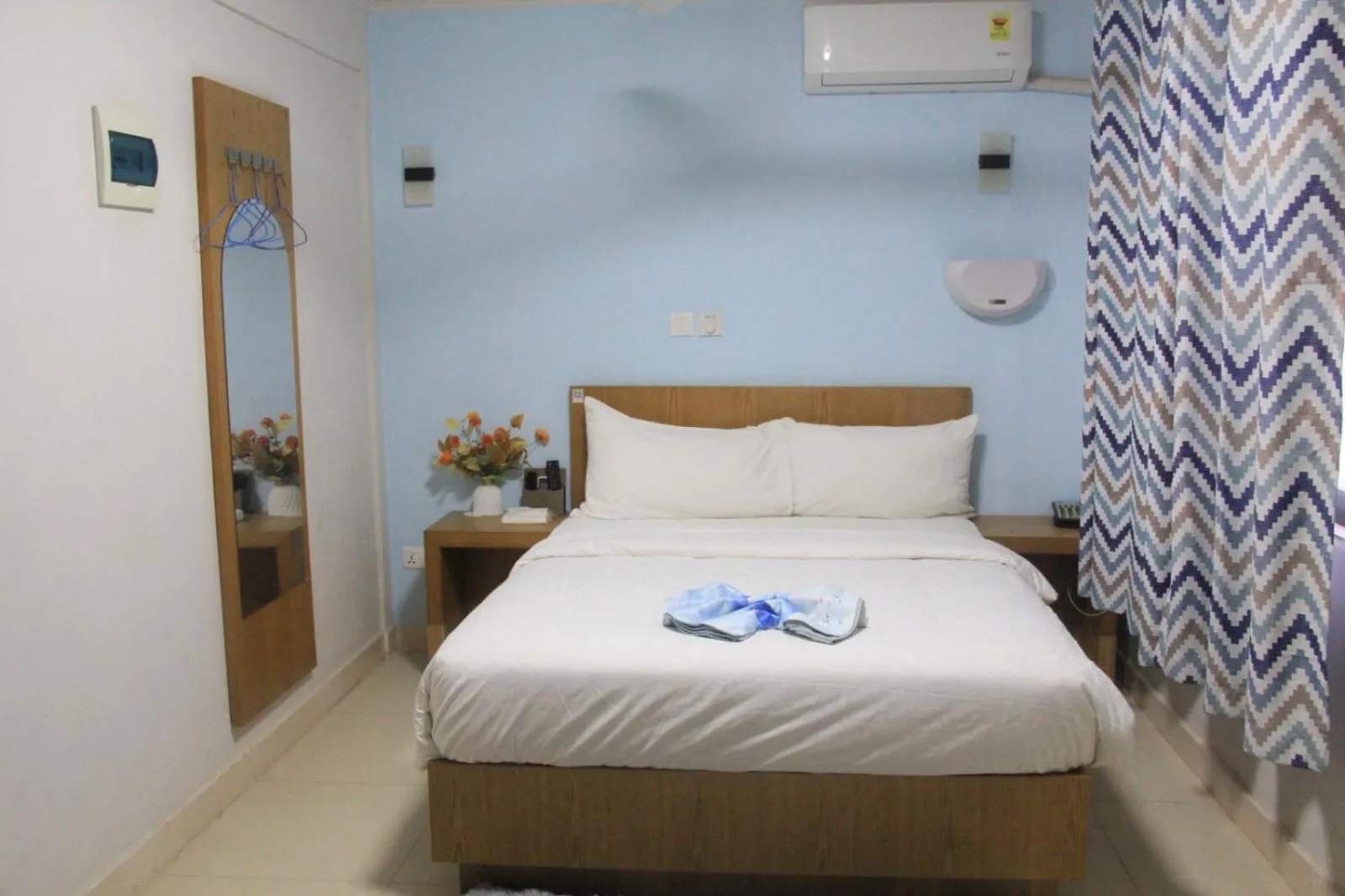 Bedroom in Canwin Hotel