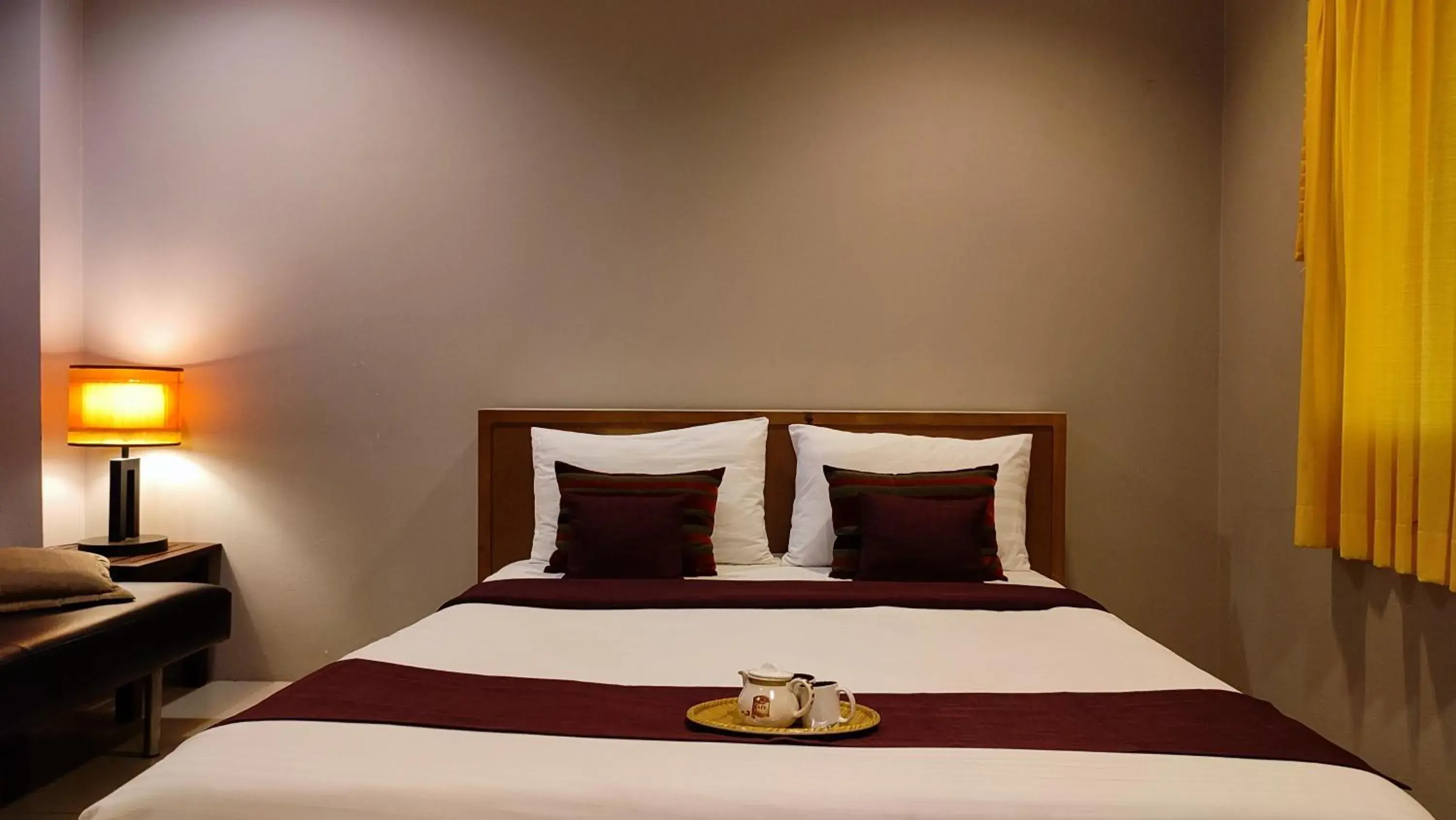 Bed in ShriGo Resort & Spa Pattaya