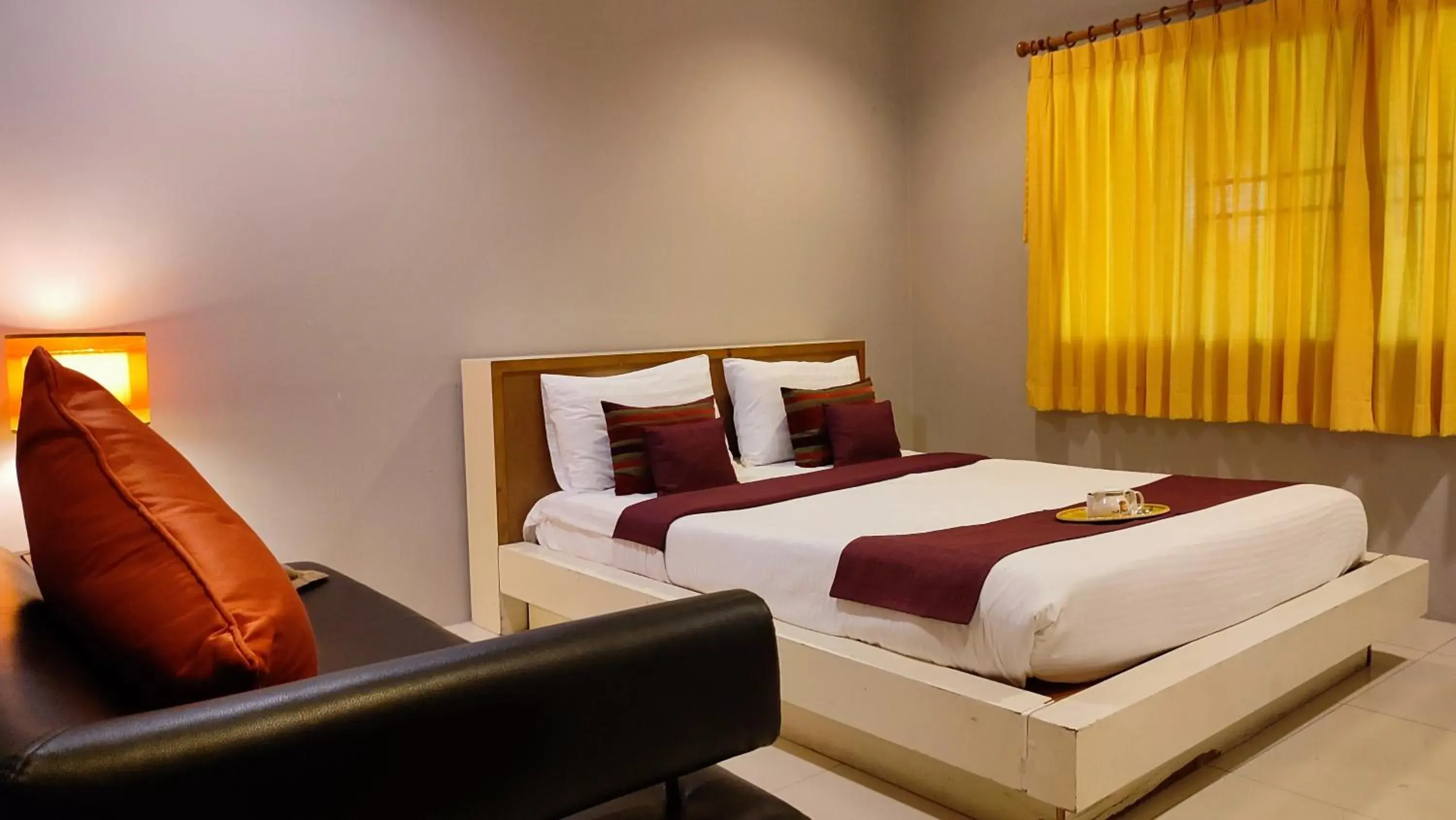 Bed in ShriGo Resort & Spa Pattaya