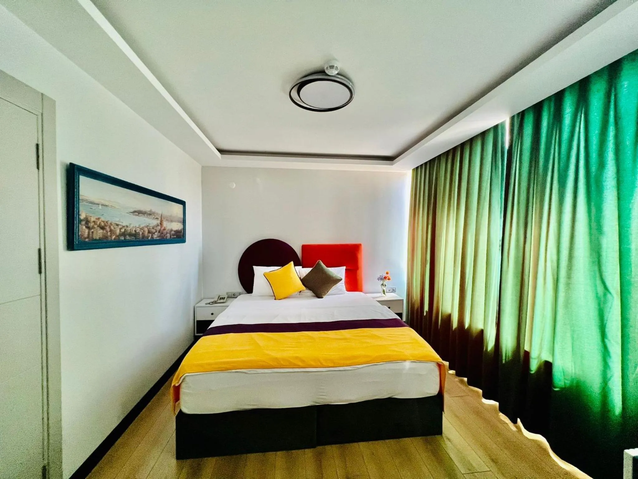 Bedroom in Apex Hotel