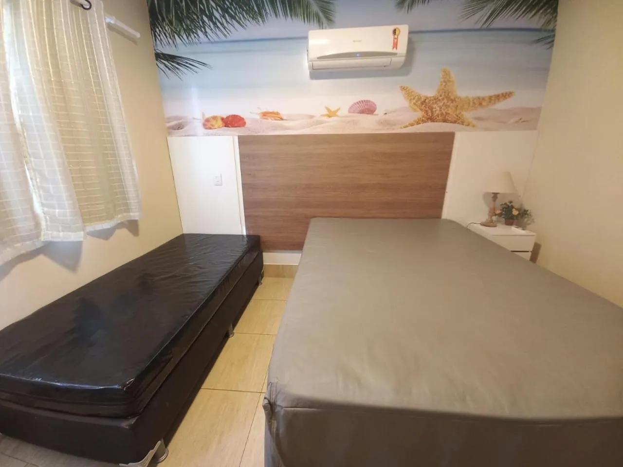 Bed in Apartamento com varanda gourmet e churrasqueira Caldas Nova