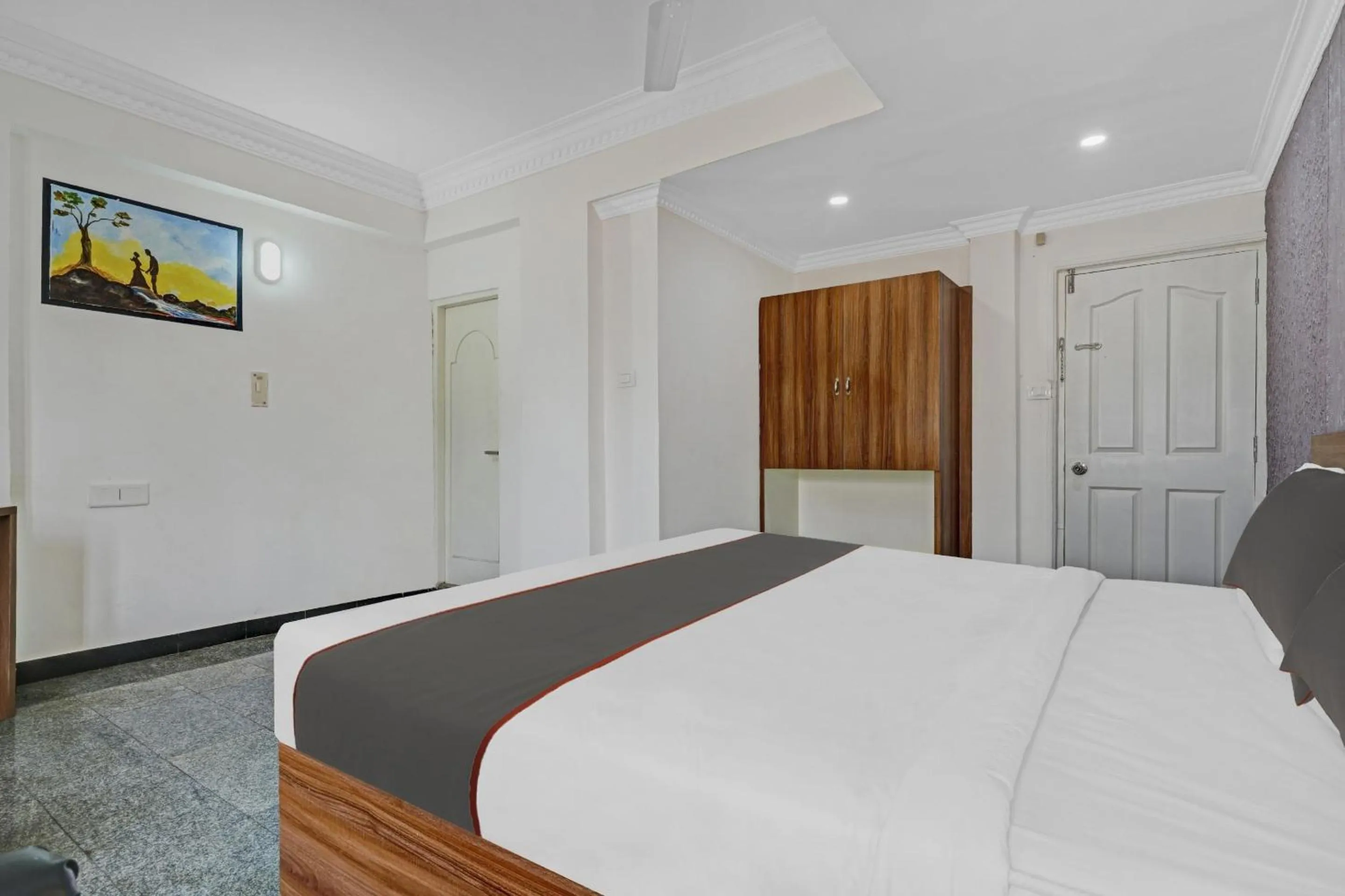 Bedroom, Bed in Capital O Rayan Plaza