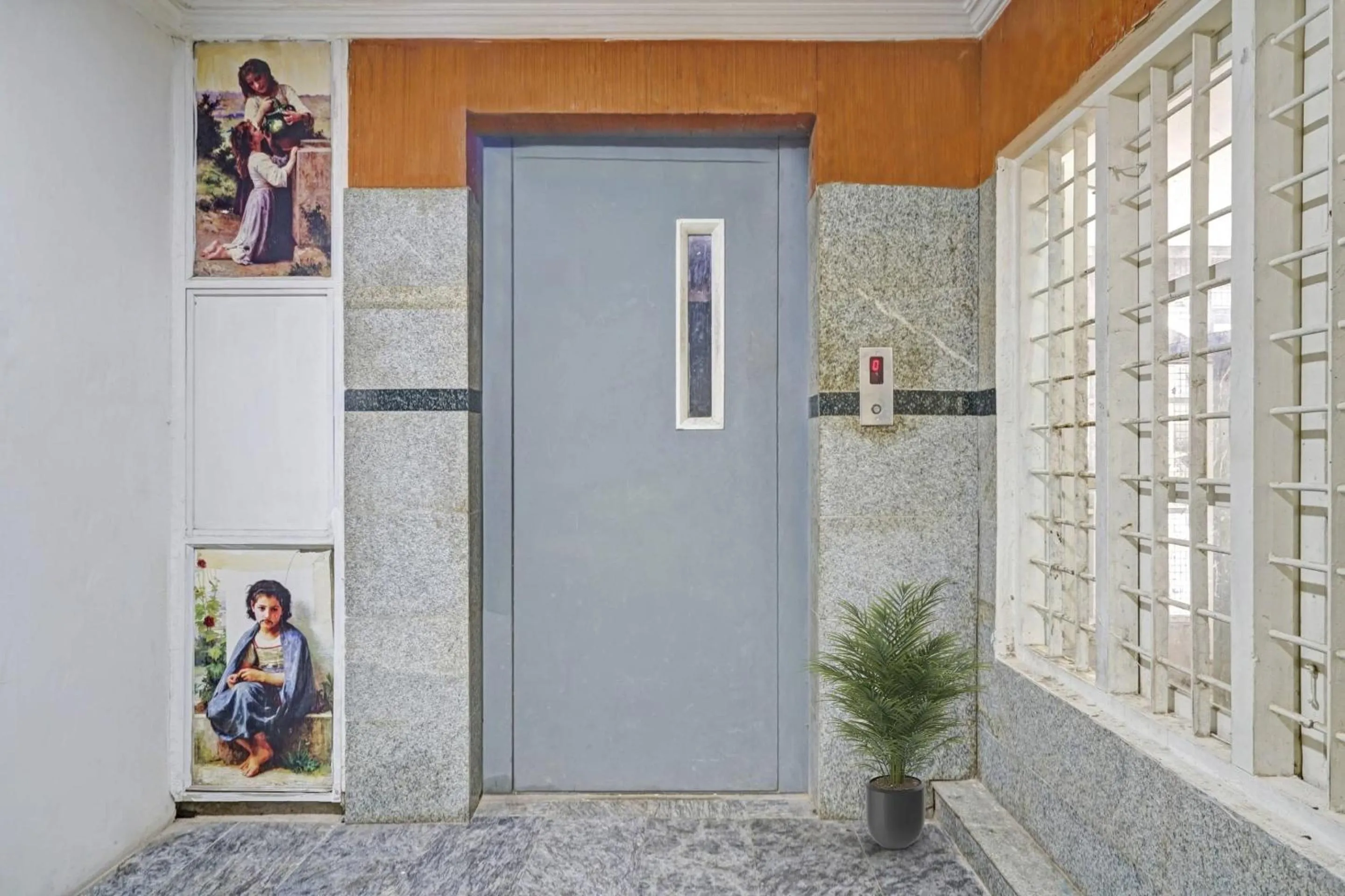 Kitchen or kitchenette in Capital O Rayan Plaza