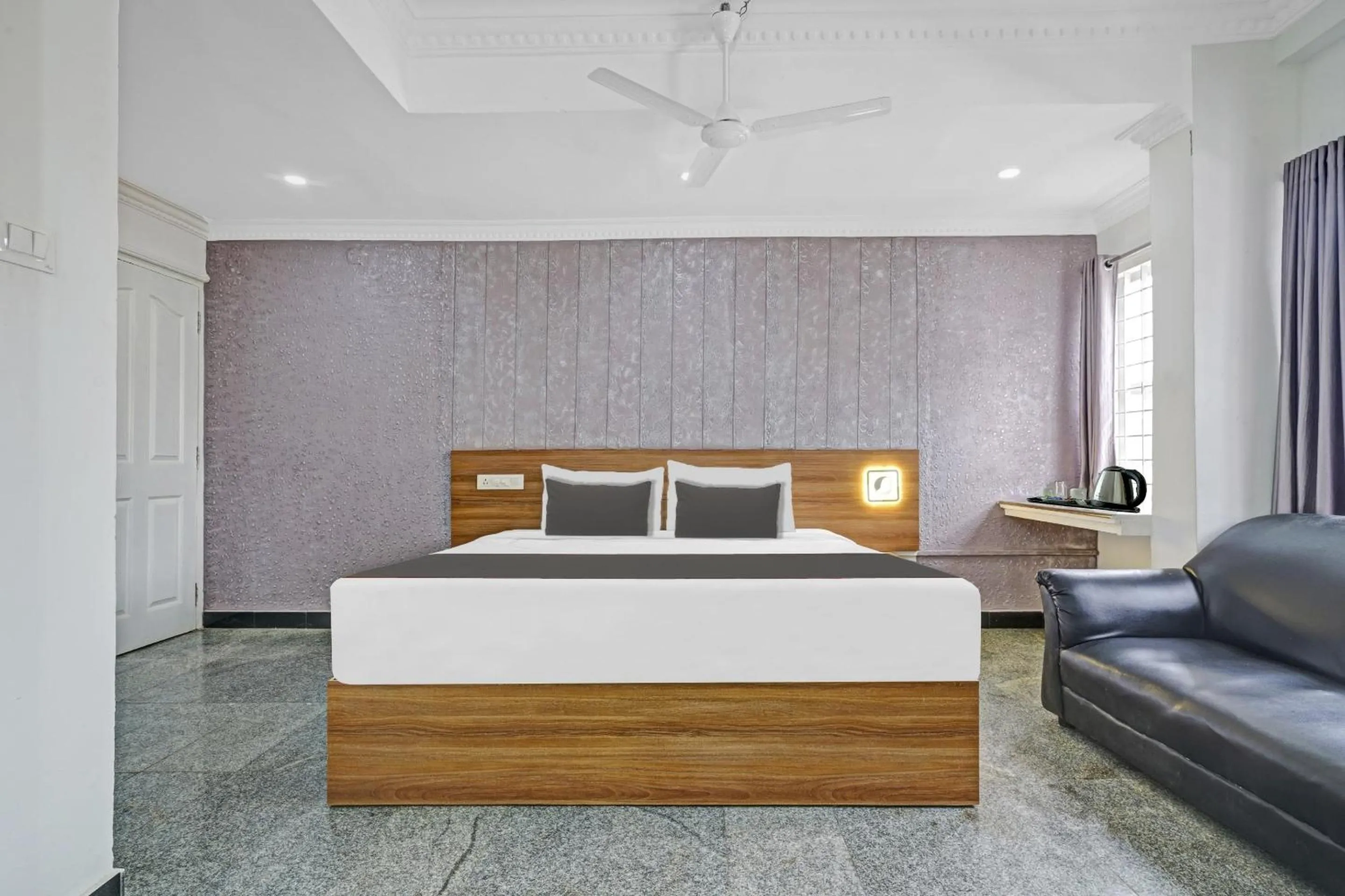 Bedroom, Bed in Capital O Rayan Plaza