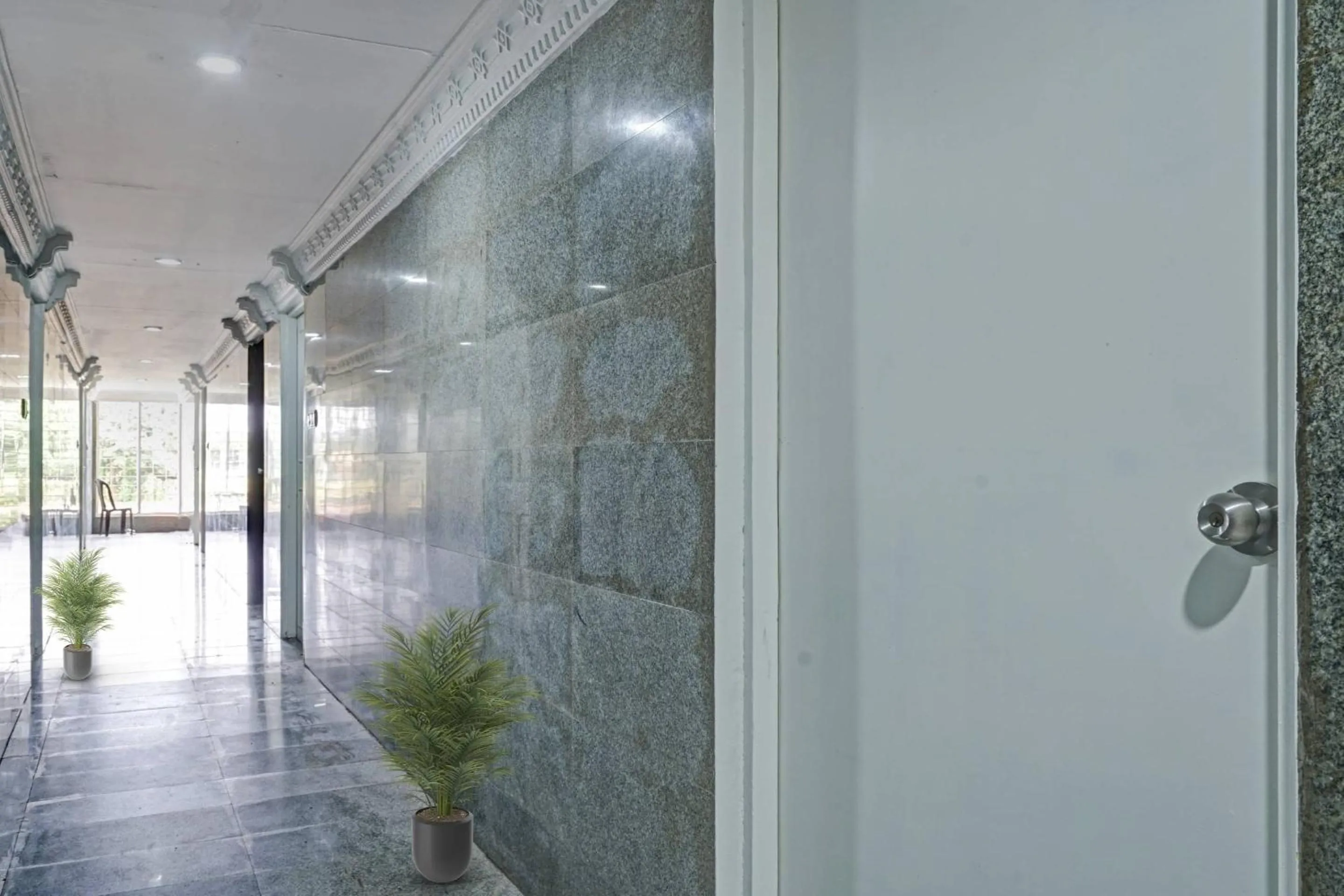 Bathroom in Capital O Rayan Plaza