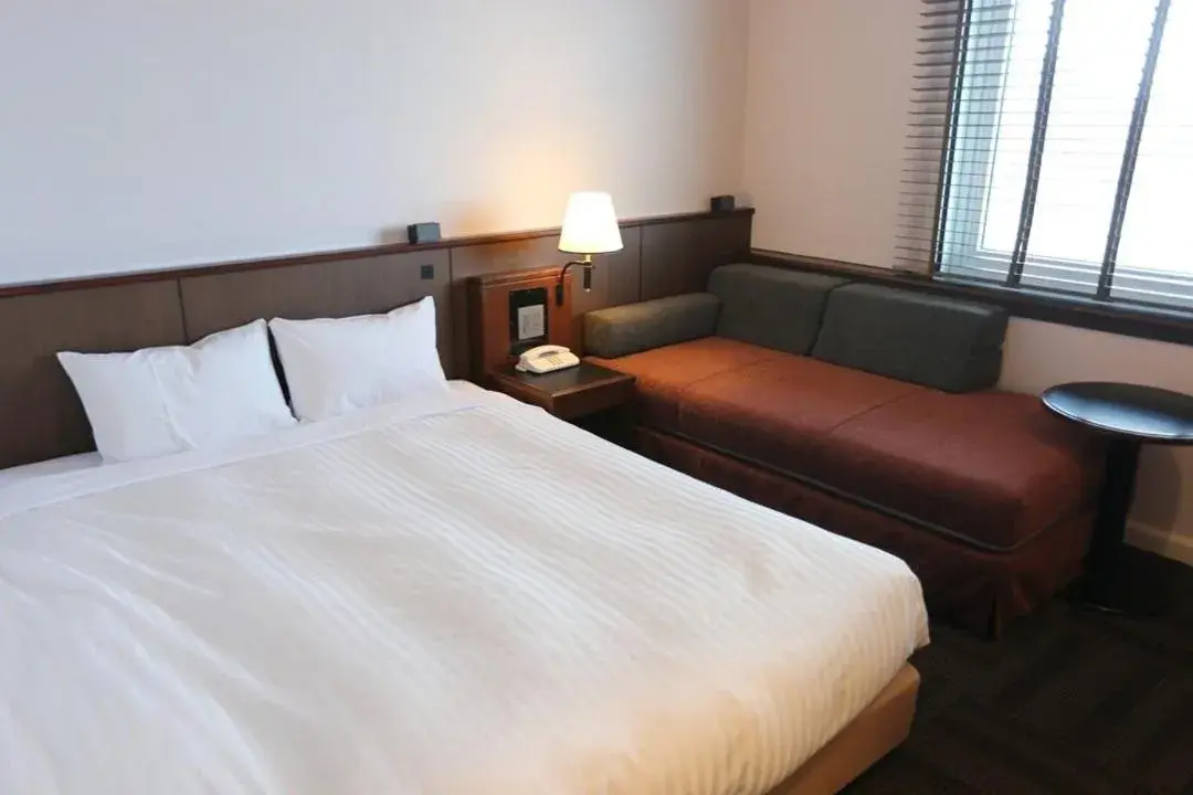 Bed in Hotel Castle Inn Tsu Bed in Hotel Castle Inn Tsu