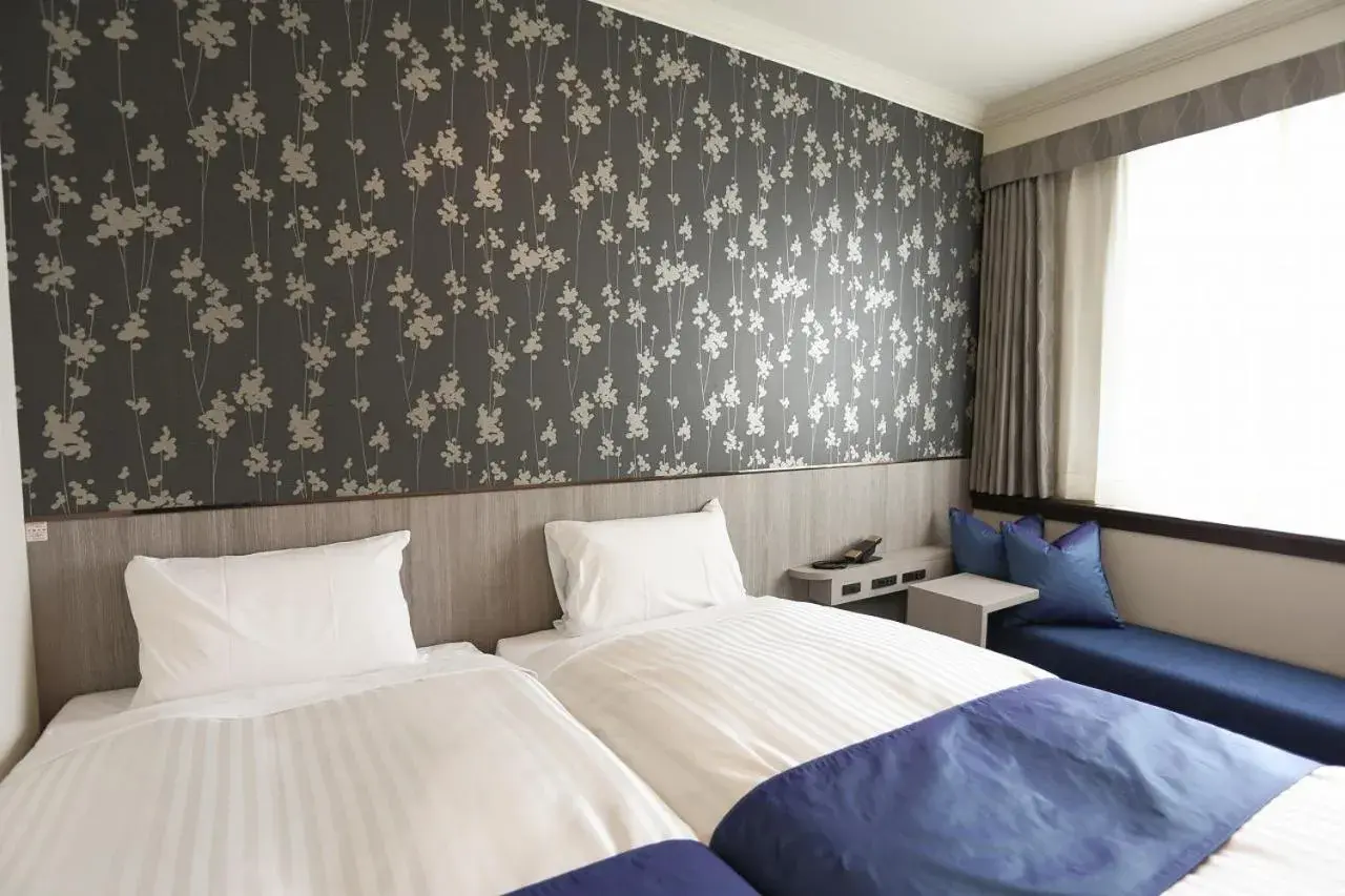 Bed in Hotel Castle Inn Tsu Bed in Hotel Castle Inn Tsu