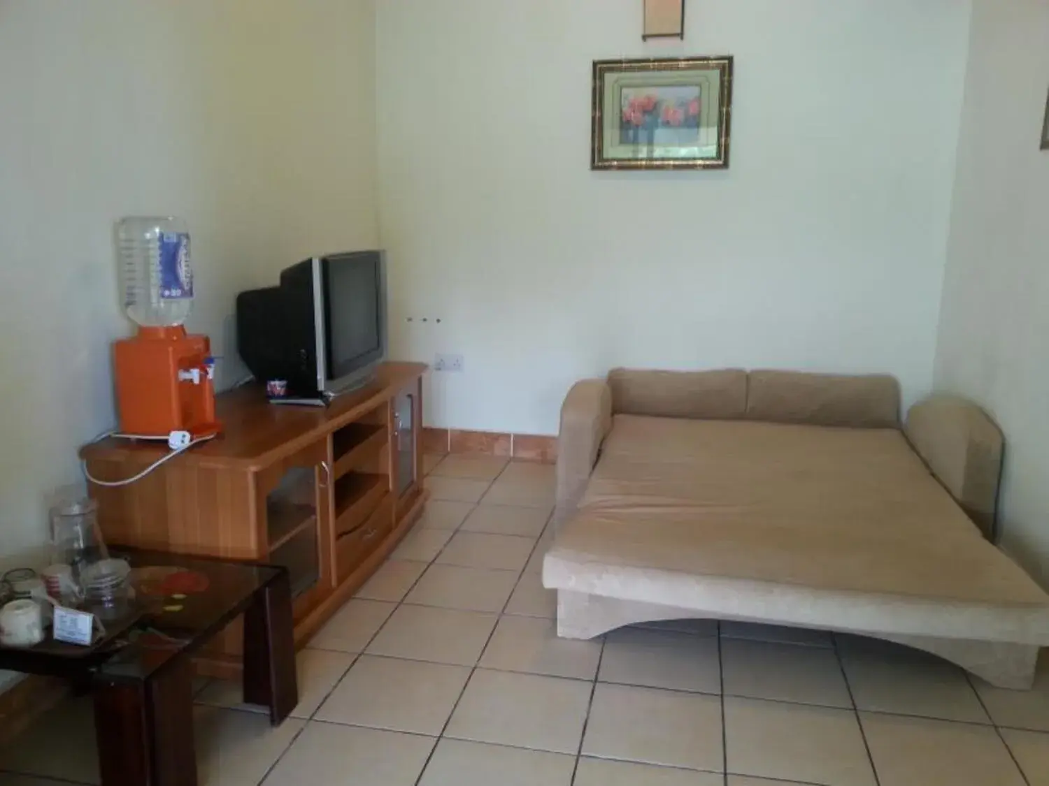 Bedroom, Seating Area in Seaside Travellers Inn