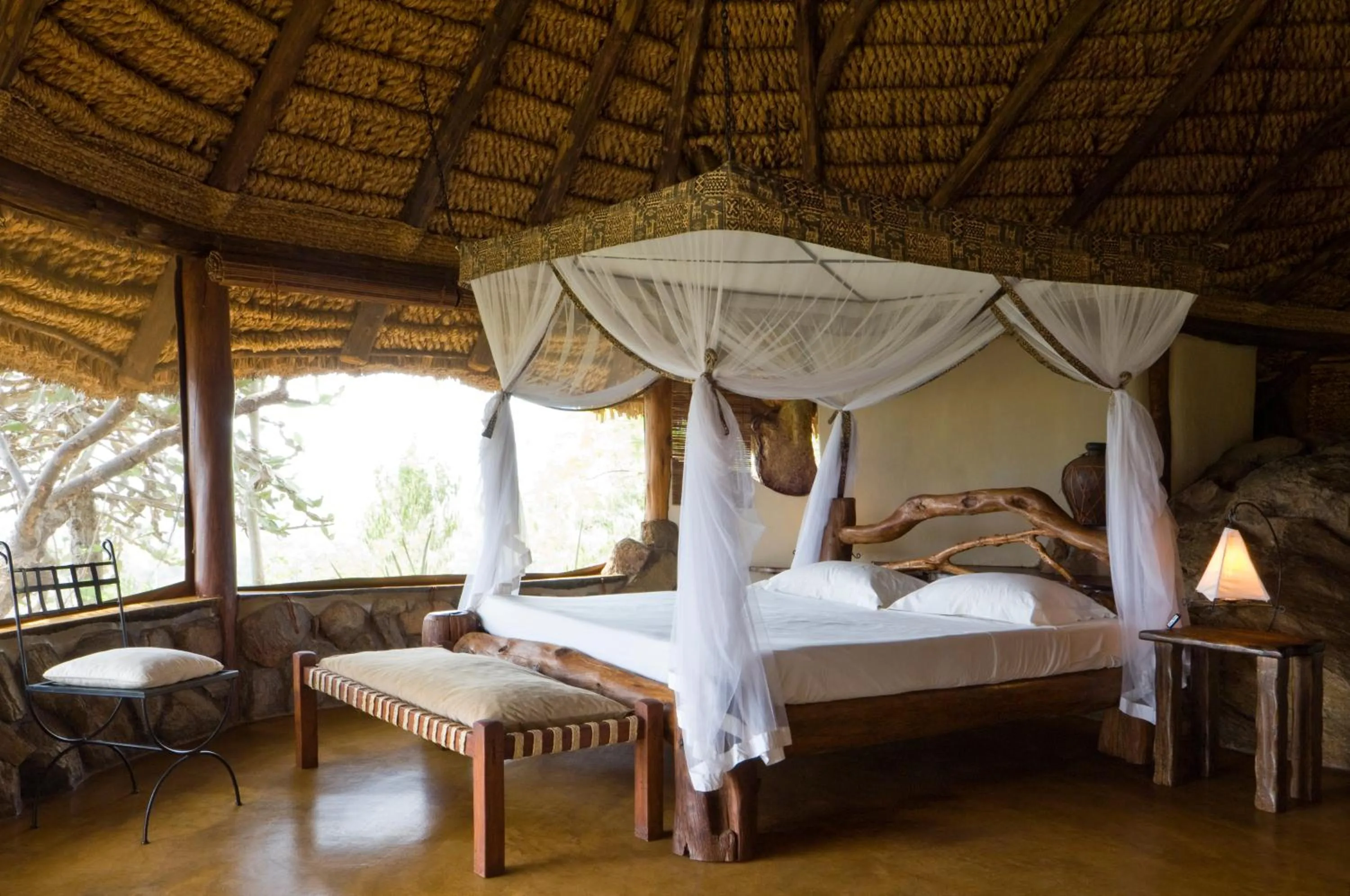 Bed in Elewana Elsa's Kopje