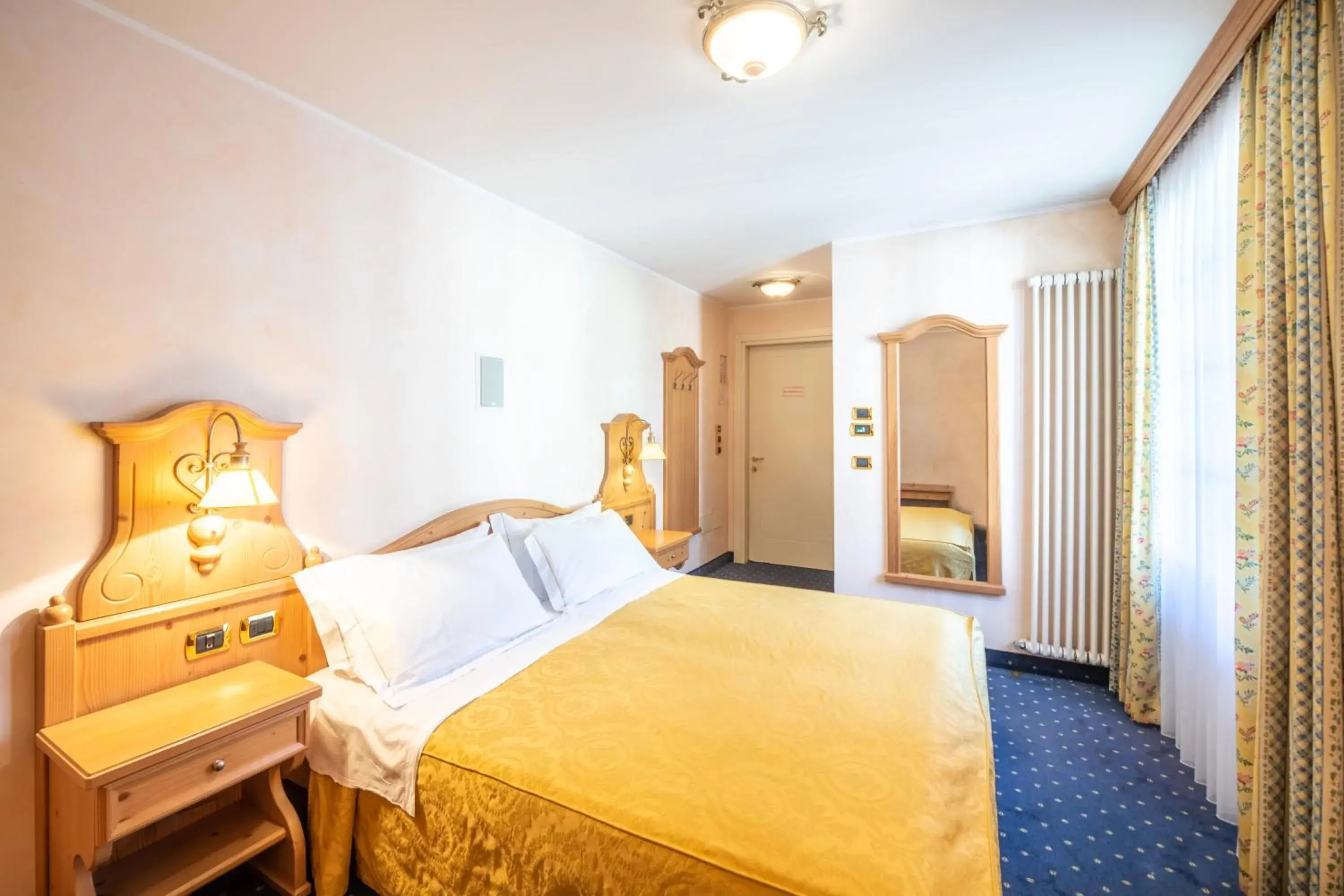 Bed in Hotel Relais Orsingher Bed in Hotel Relais Orsingher