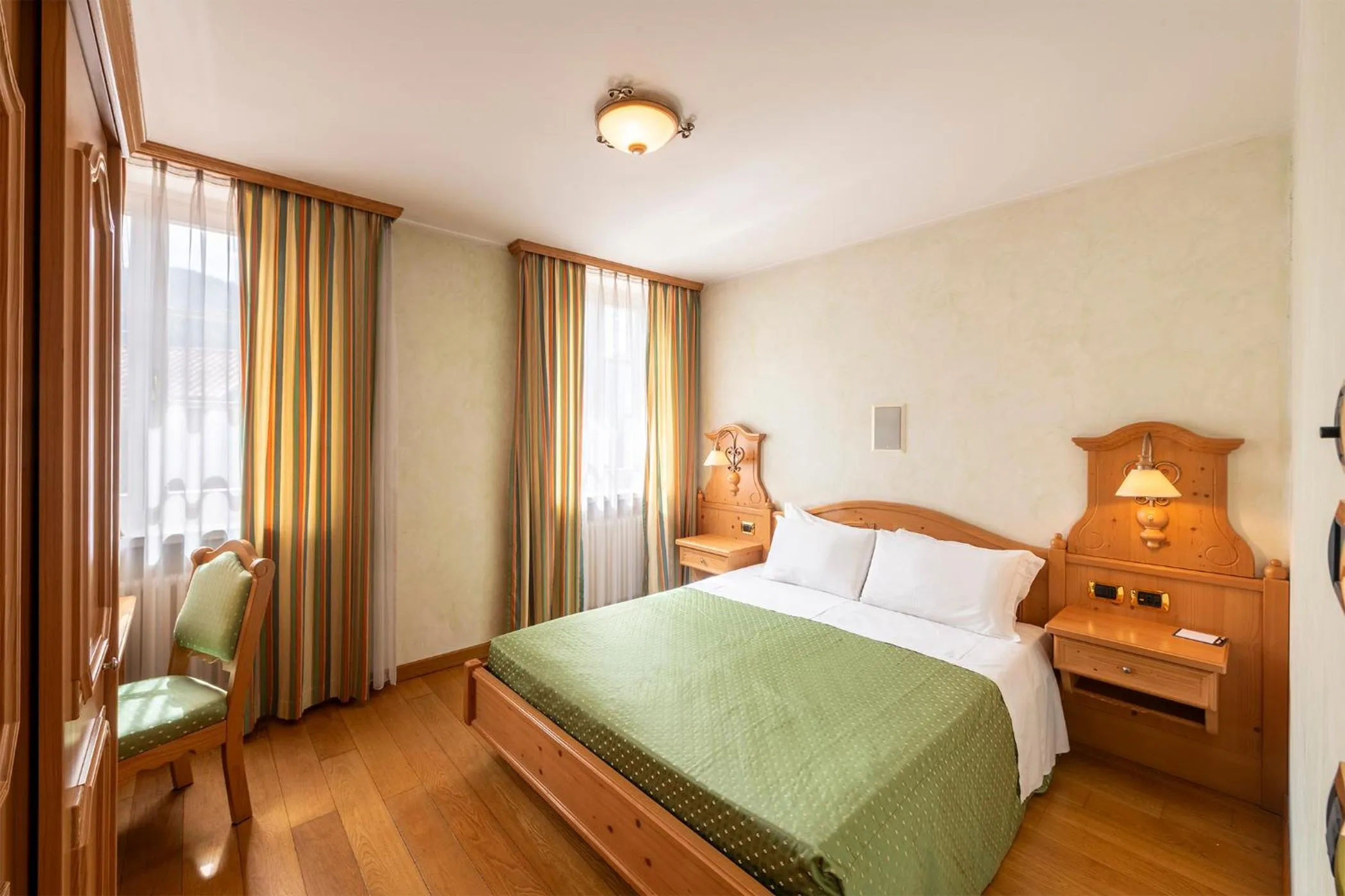 Bed in Hotel Relais Orsingher