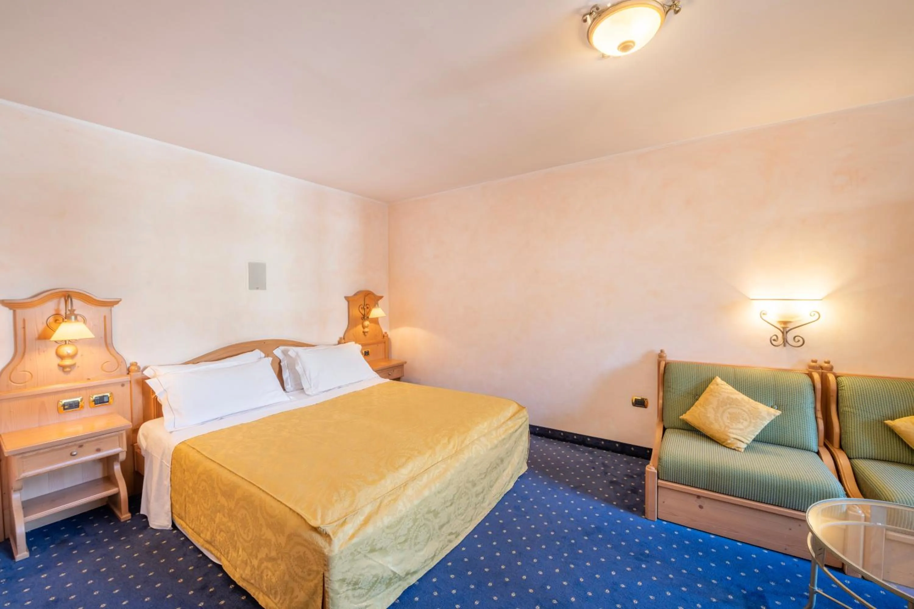 Bed in Hotel Relais Orsingher