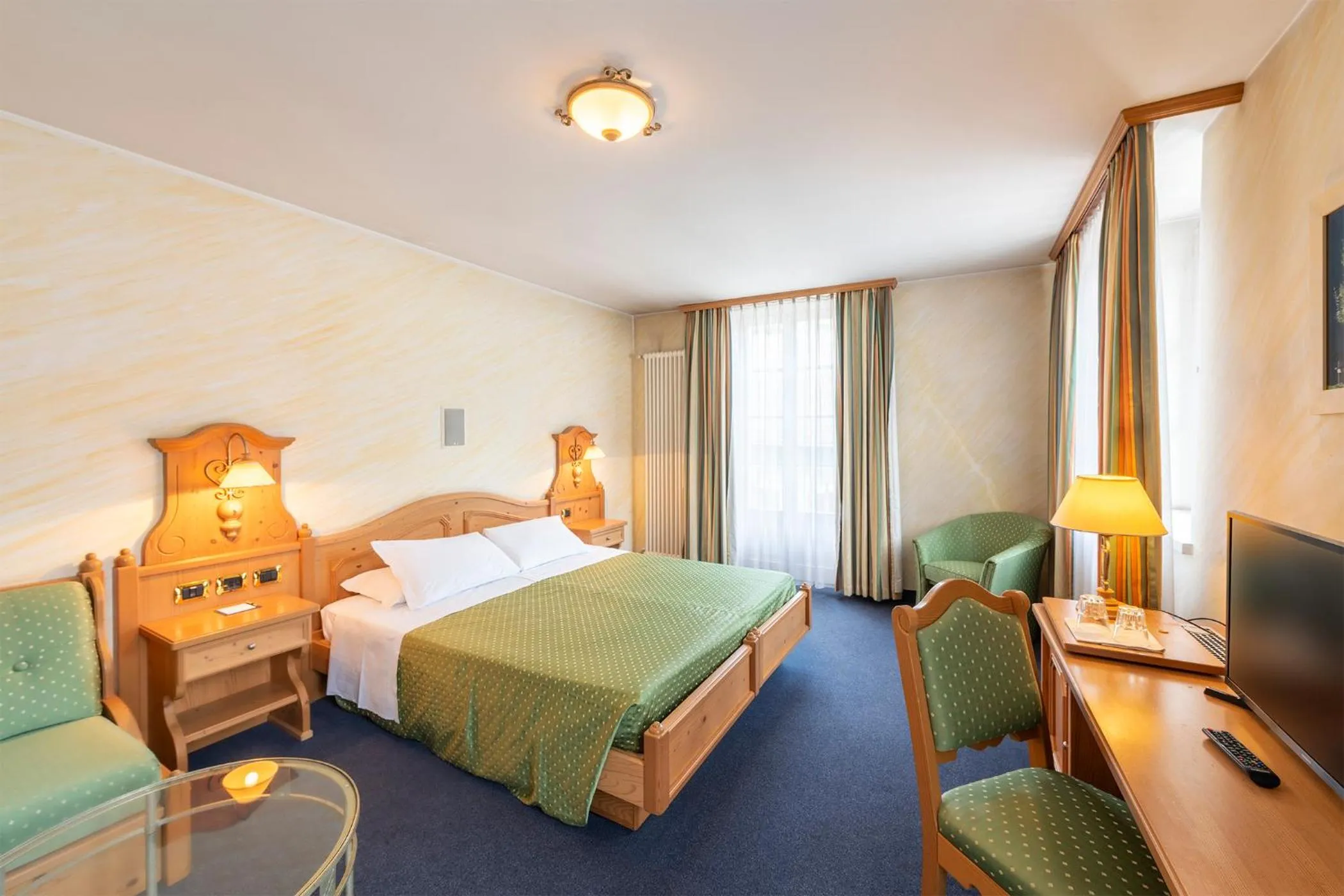 Bed in Hotel Relais Orsingher