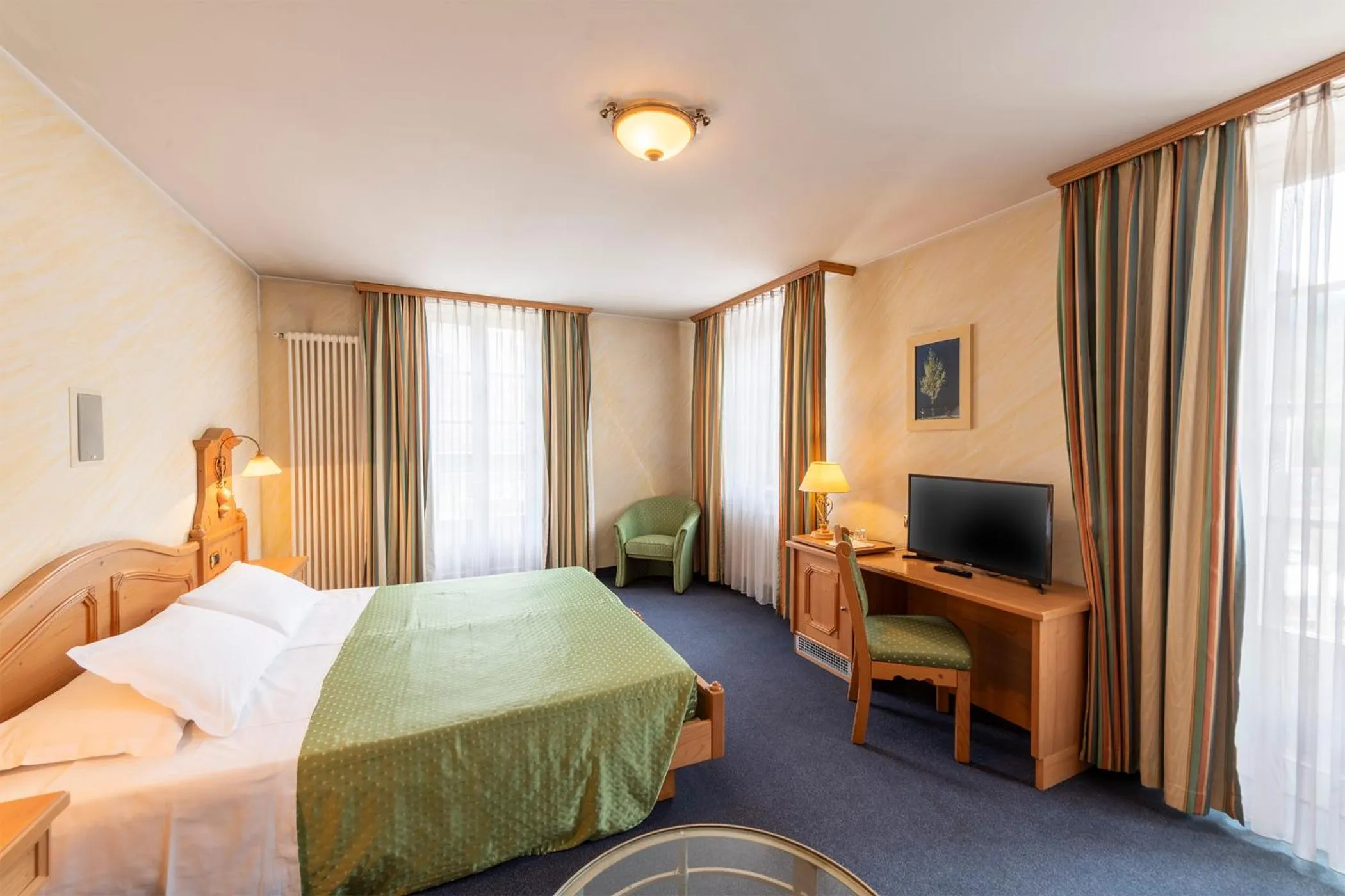 Bed in Hotel Relais Orsingher