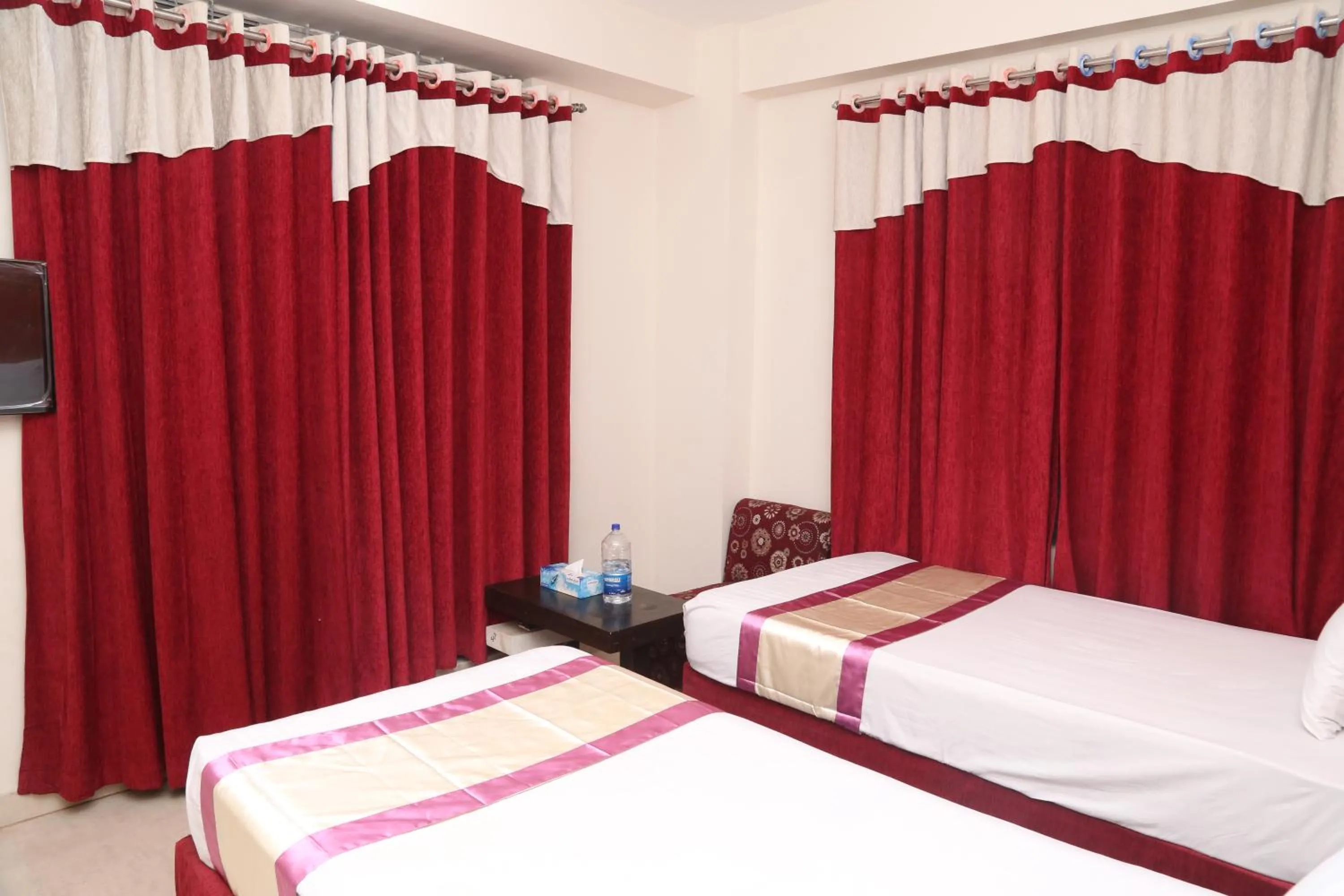 Bed in Platinum Hotel Ltd