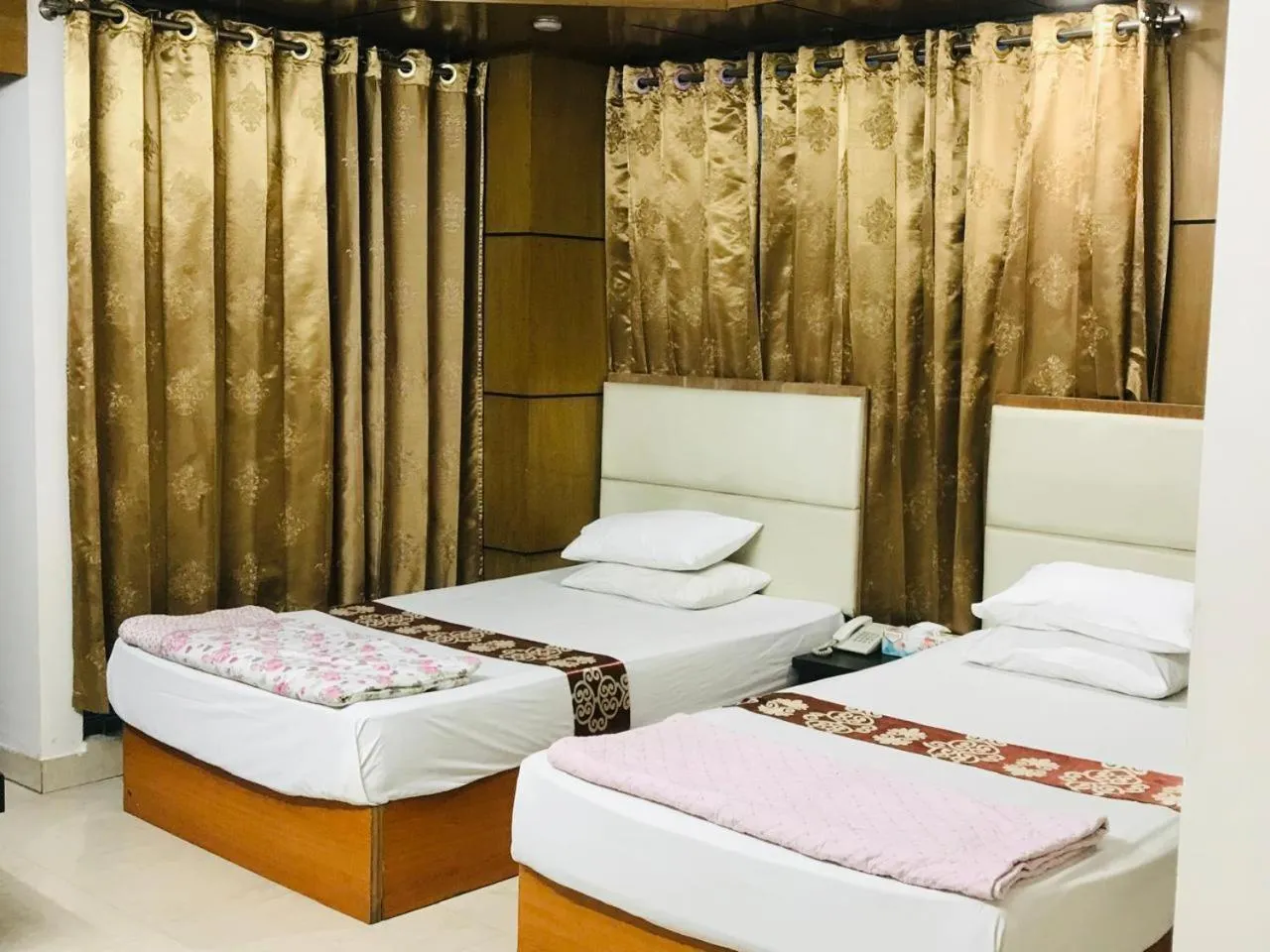 Bed in Platinum Hotel Ltd