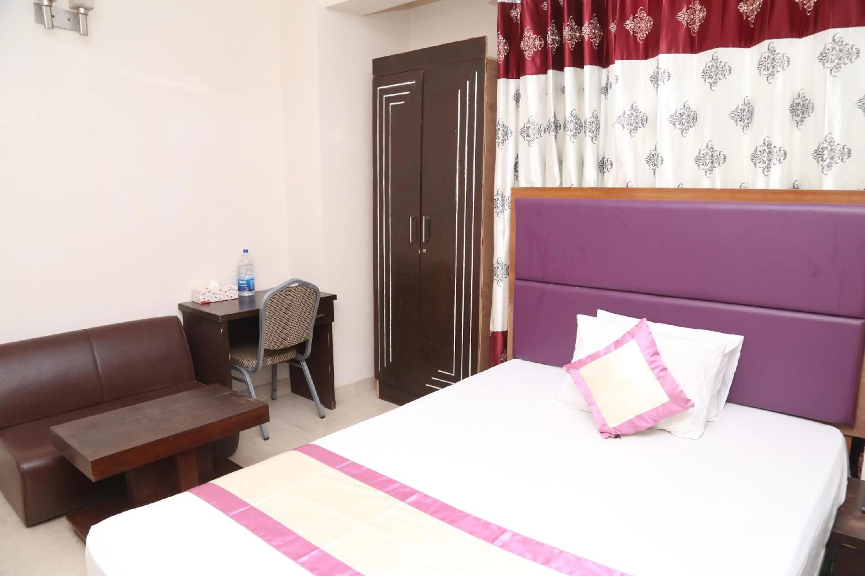 Bed in Platinum Hotel Ltd