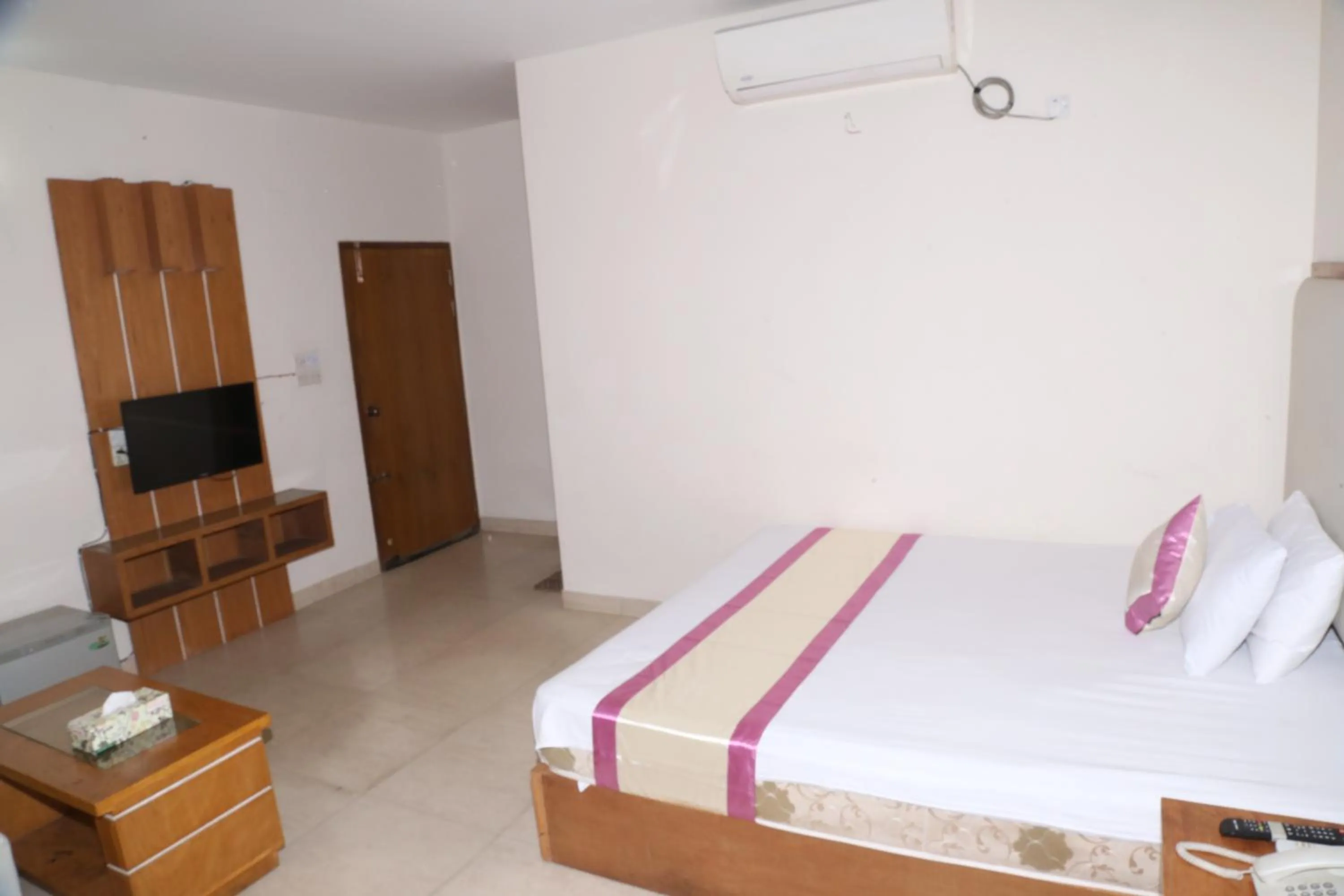 Bed in Platinum Hotel Ltd