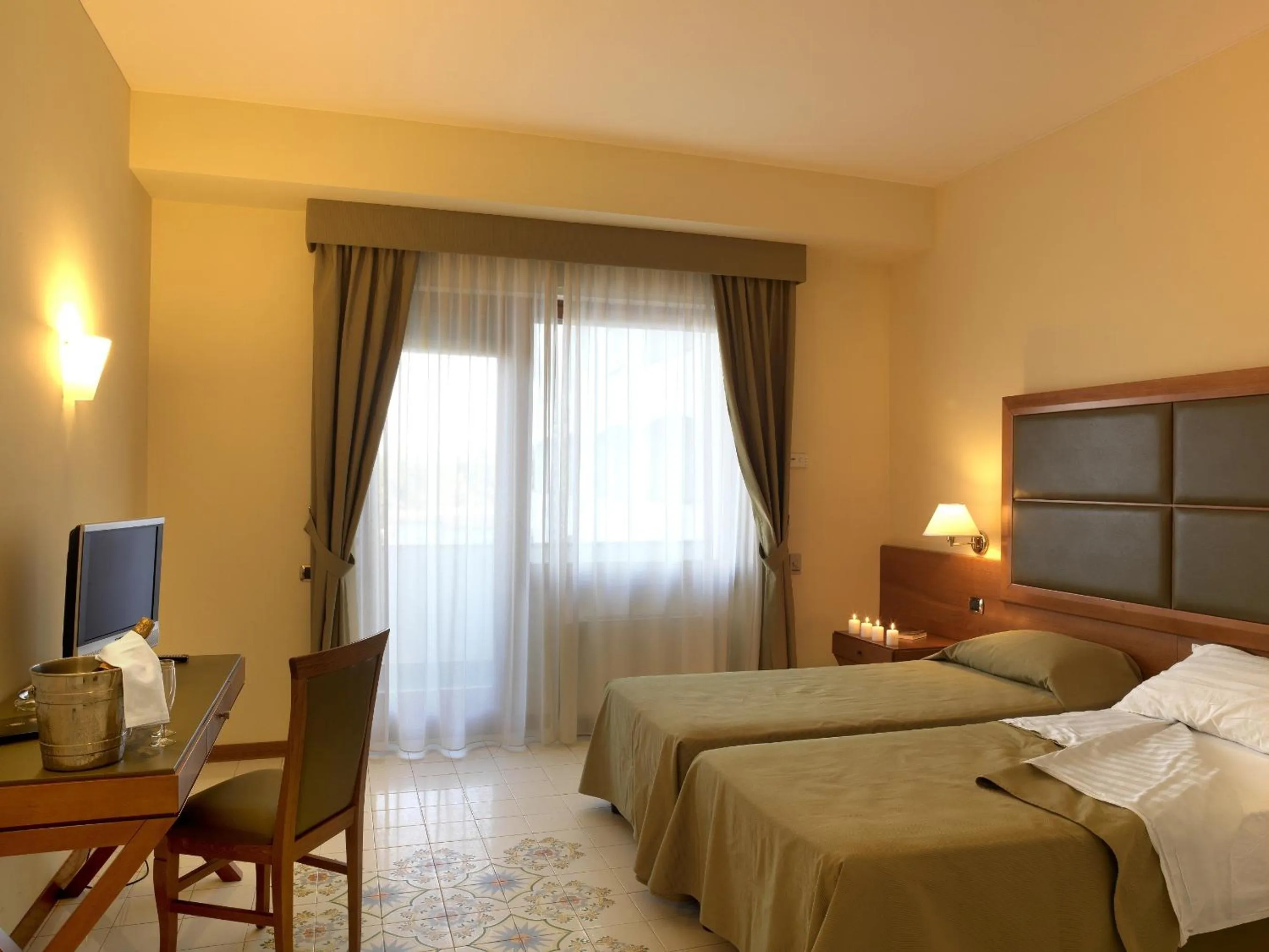 Bed in Grand Hotel Don Juan