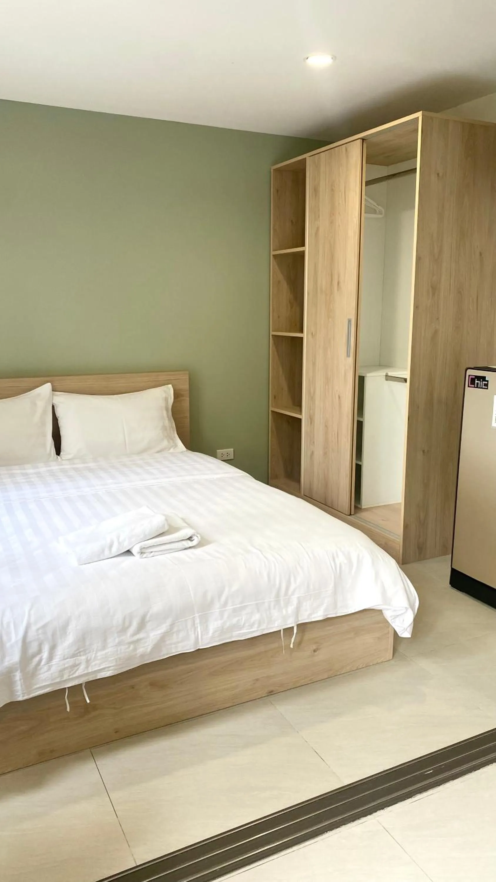 Bed in POP Heritage Residence