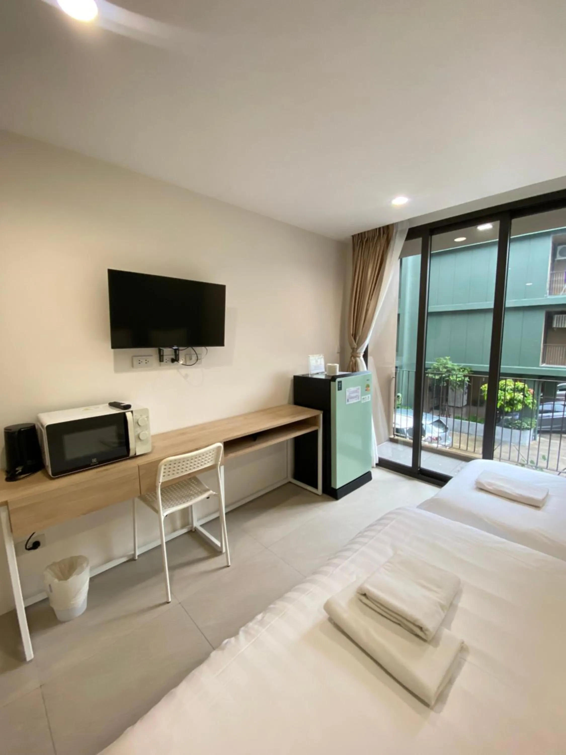 Bed in POP Heritage Residence