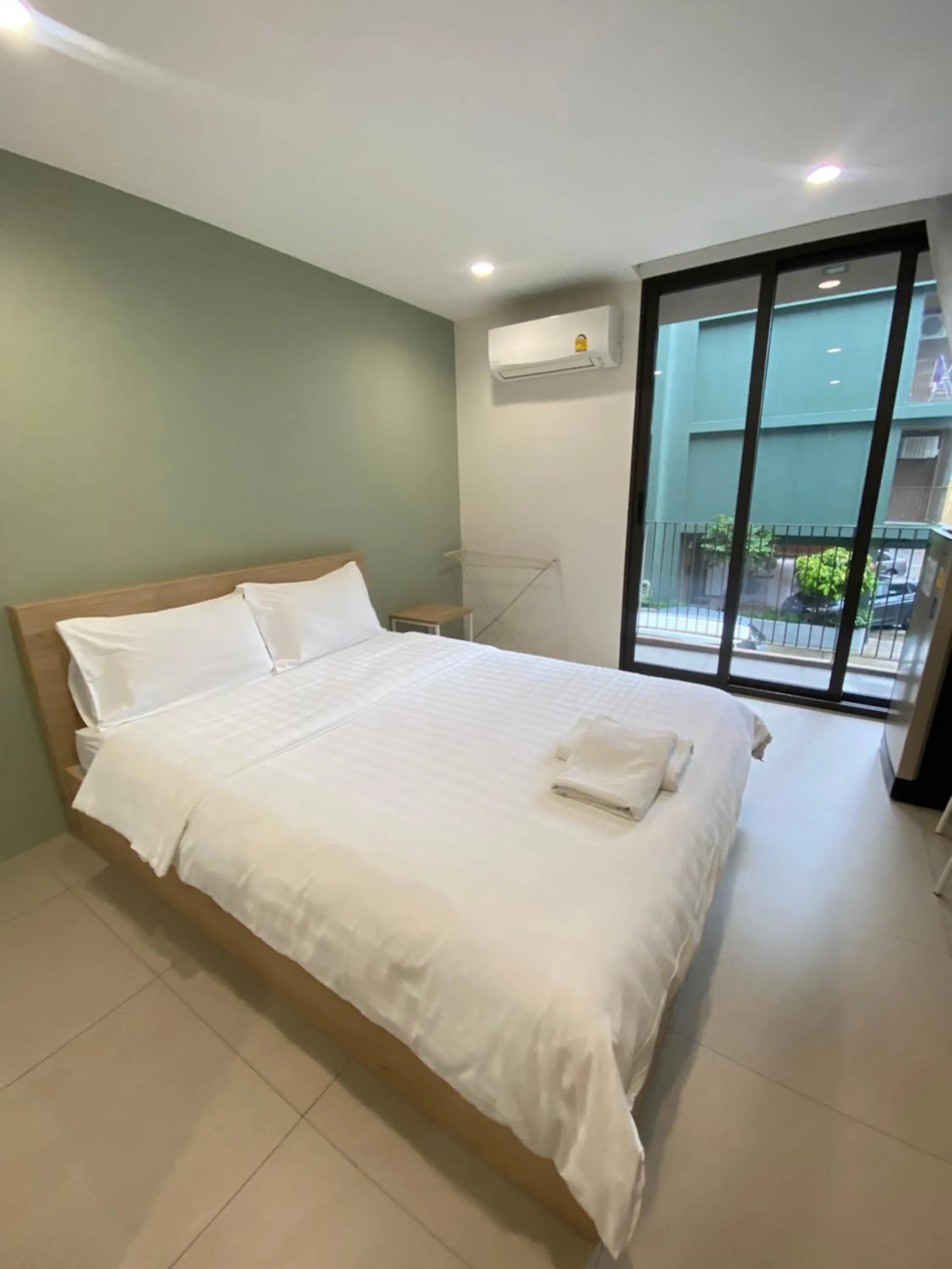 Bed in POP Heritage Residence