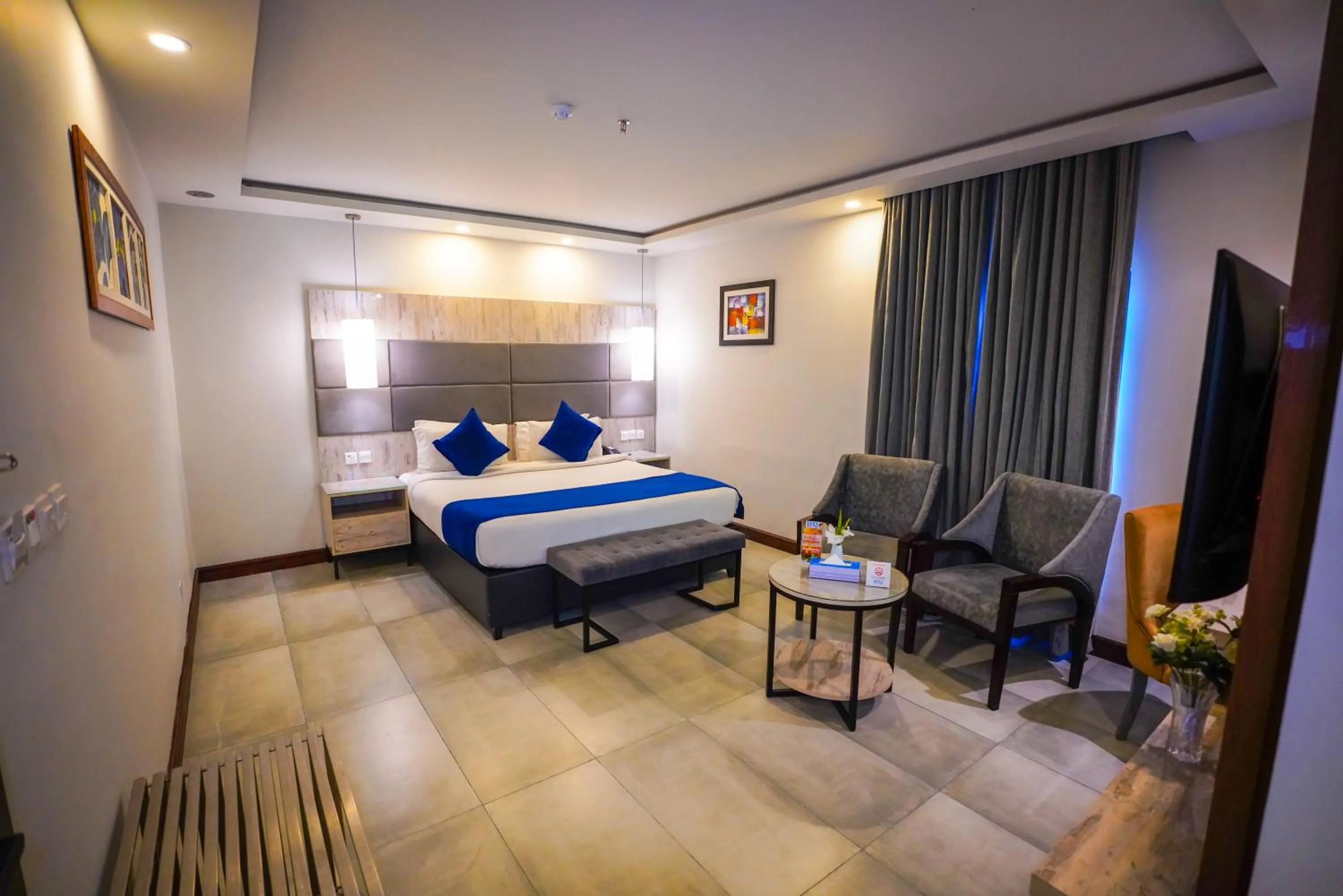 Bed in IFQ Hotel & Resort Islamabad