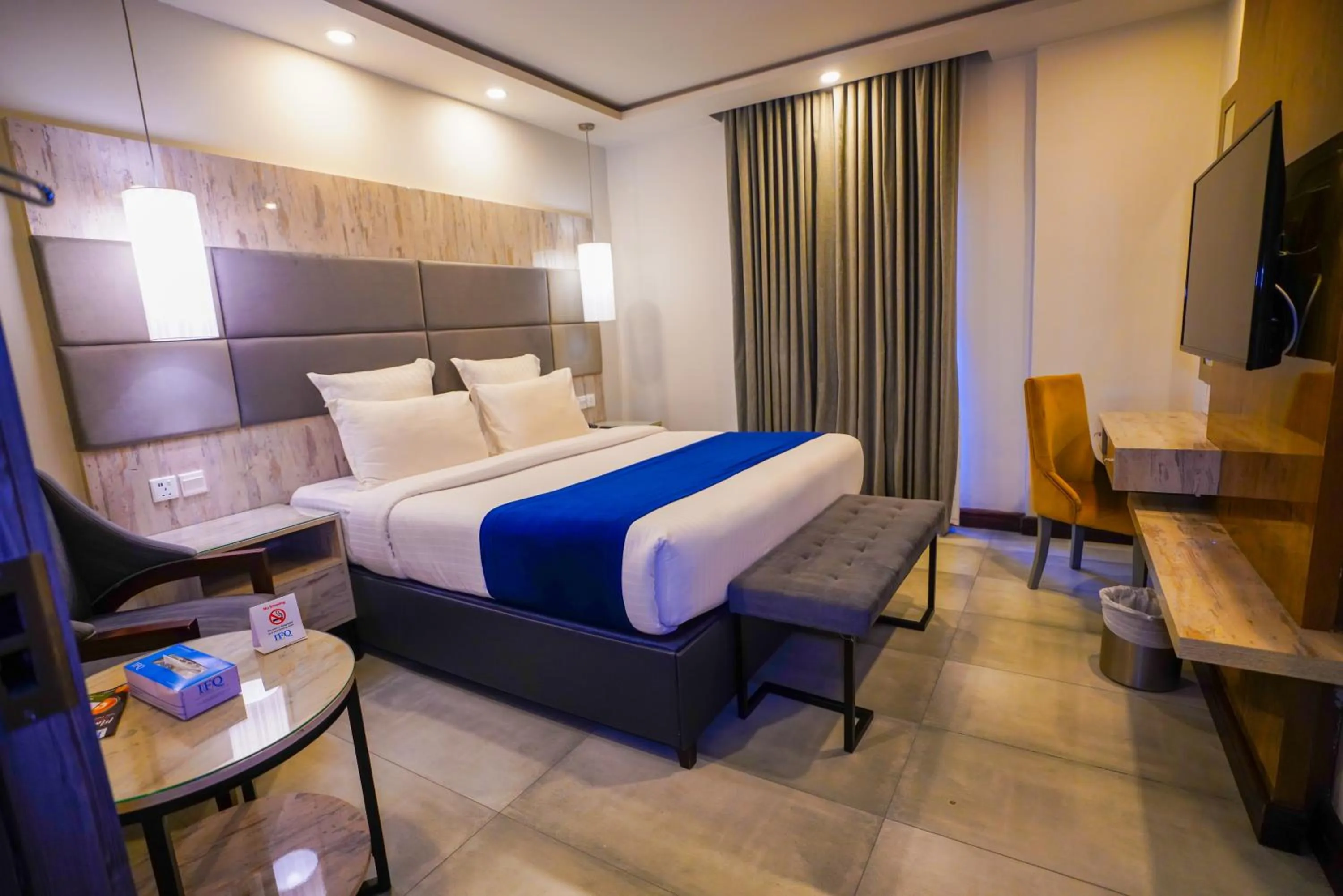 Communal lounge/ TV room, Bed in IFQ Hotel & Resort Islamabad