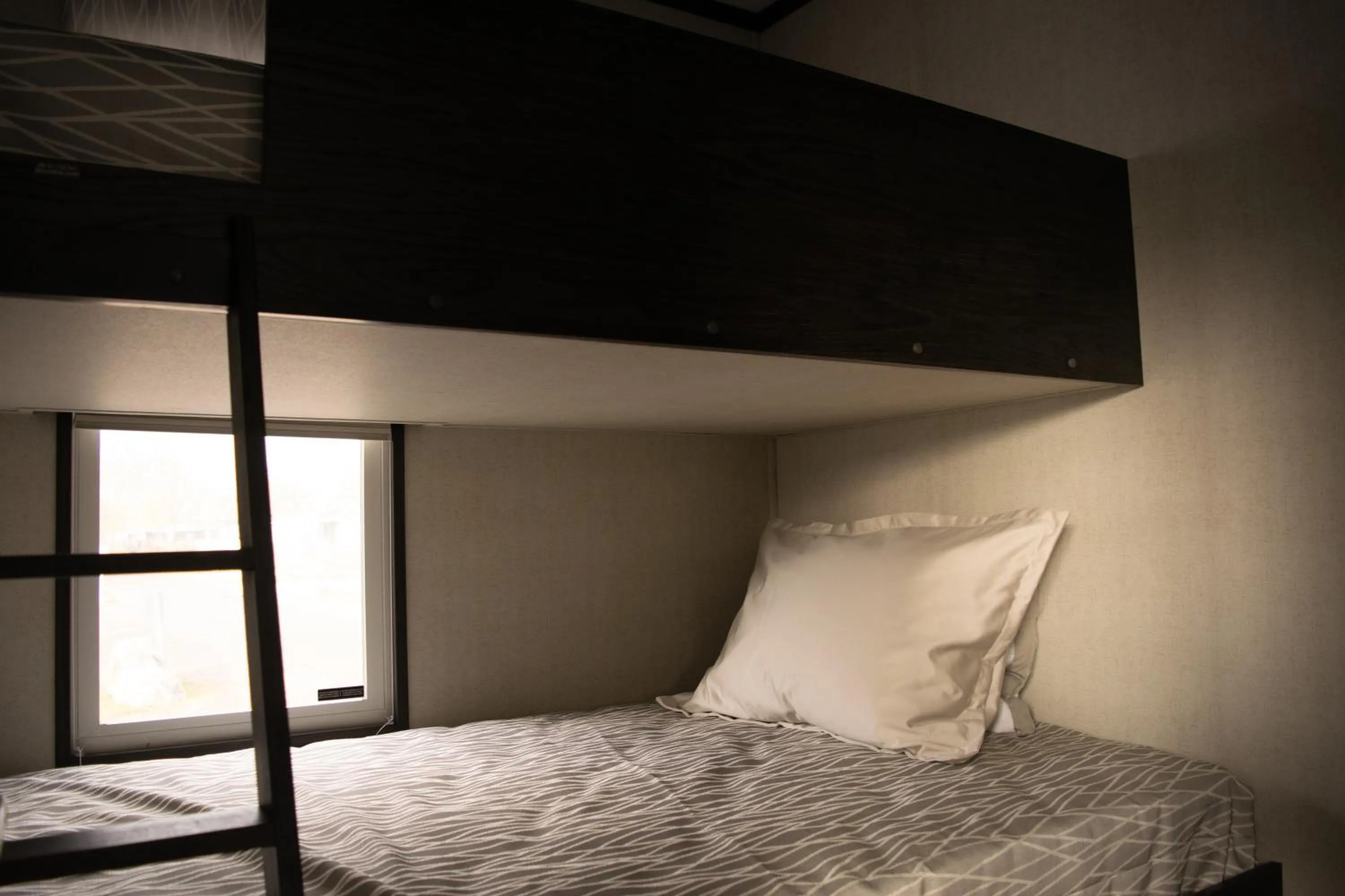 Bedroom, Bed in Vine Ridge Resort - Cottages