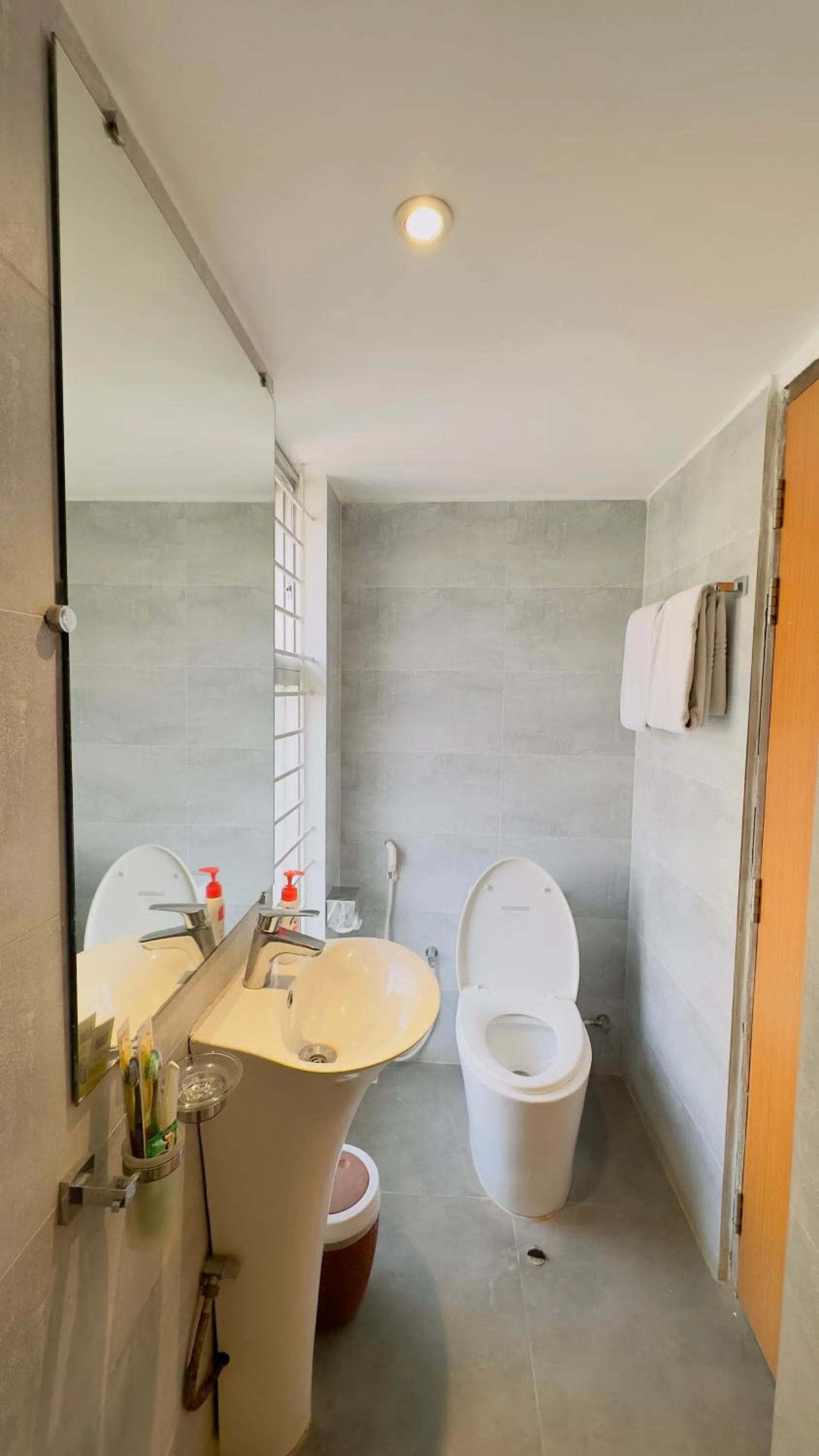 Toilet in Priyo Nibash Stylish Residential Hotel