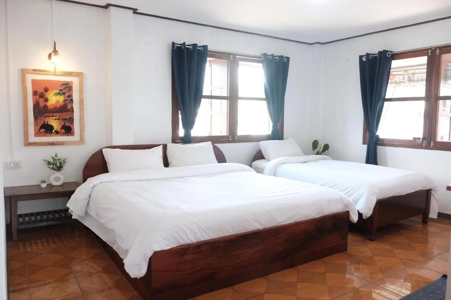 Bed in Sabaydee Guesthouse