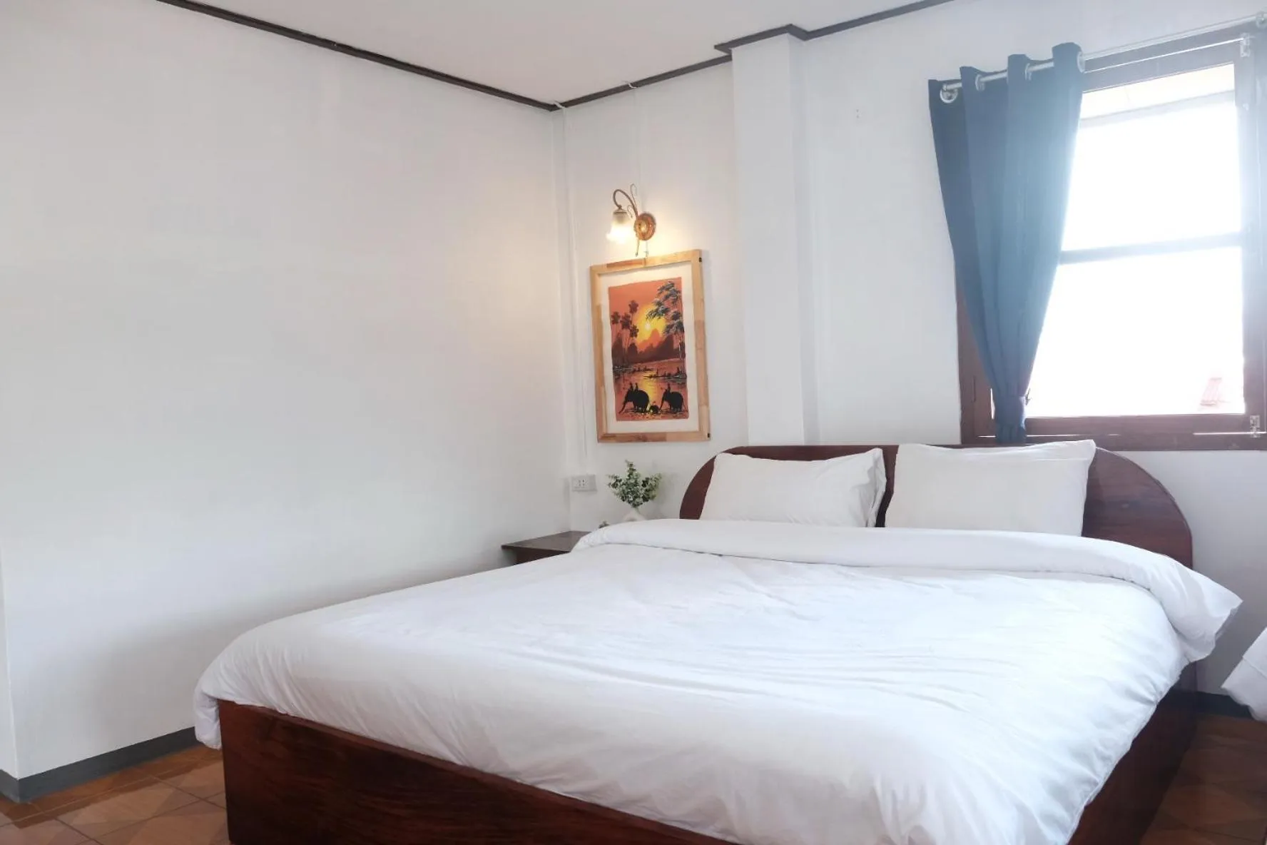 Bed in Sabaydee Guesthouse