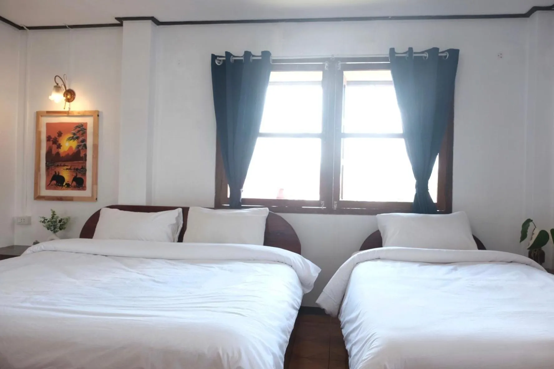 Bed in Sabaydee Guesthouse