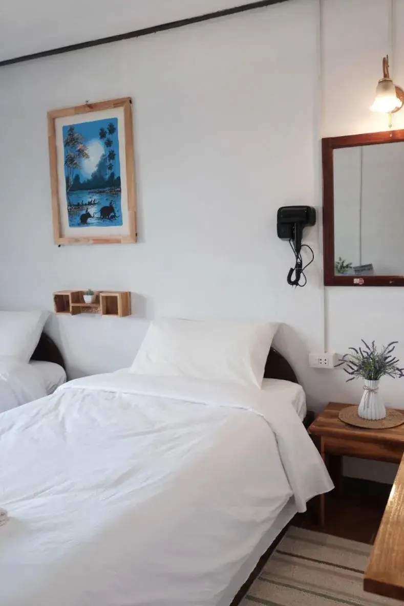 Bed in Sabaydee Guesthouse Bed in Sabaydee Guesthouse