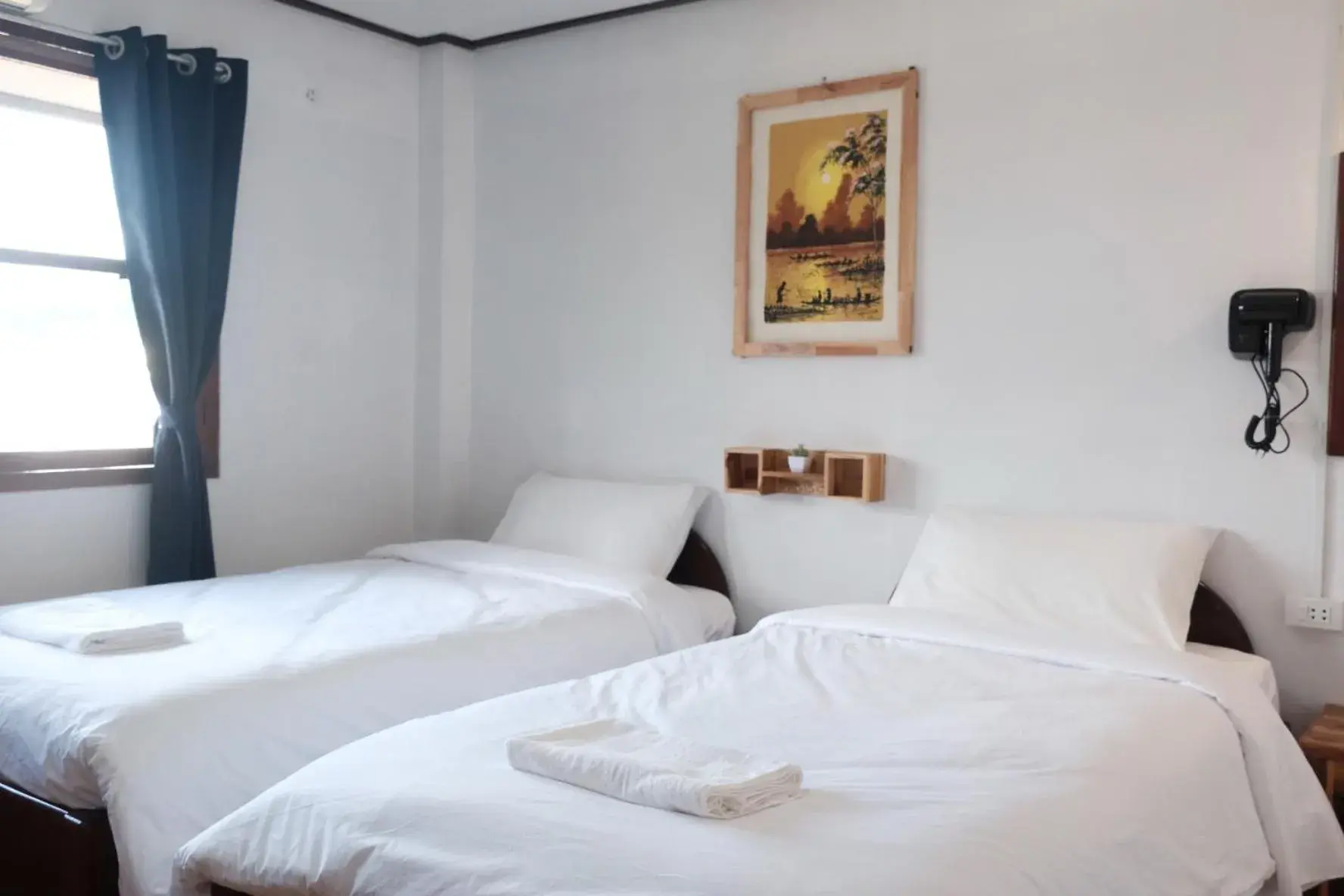 Twin Room in Sabaydee Guesthouse Twin Room in Sabaydee Guesthouse