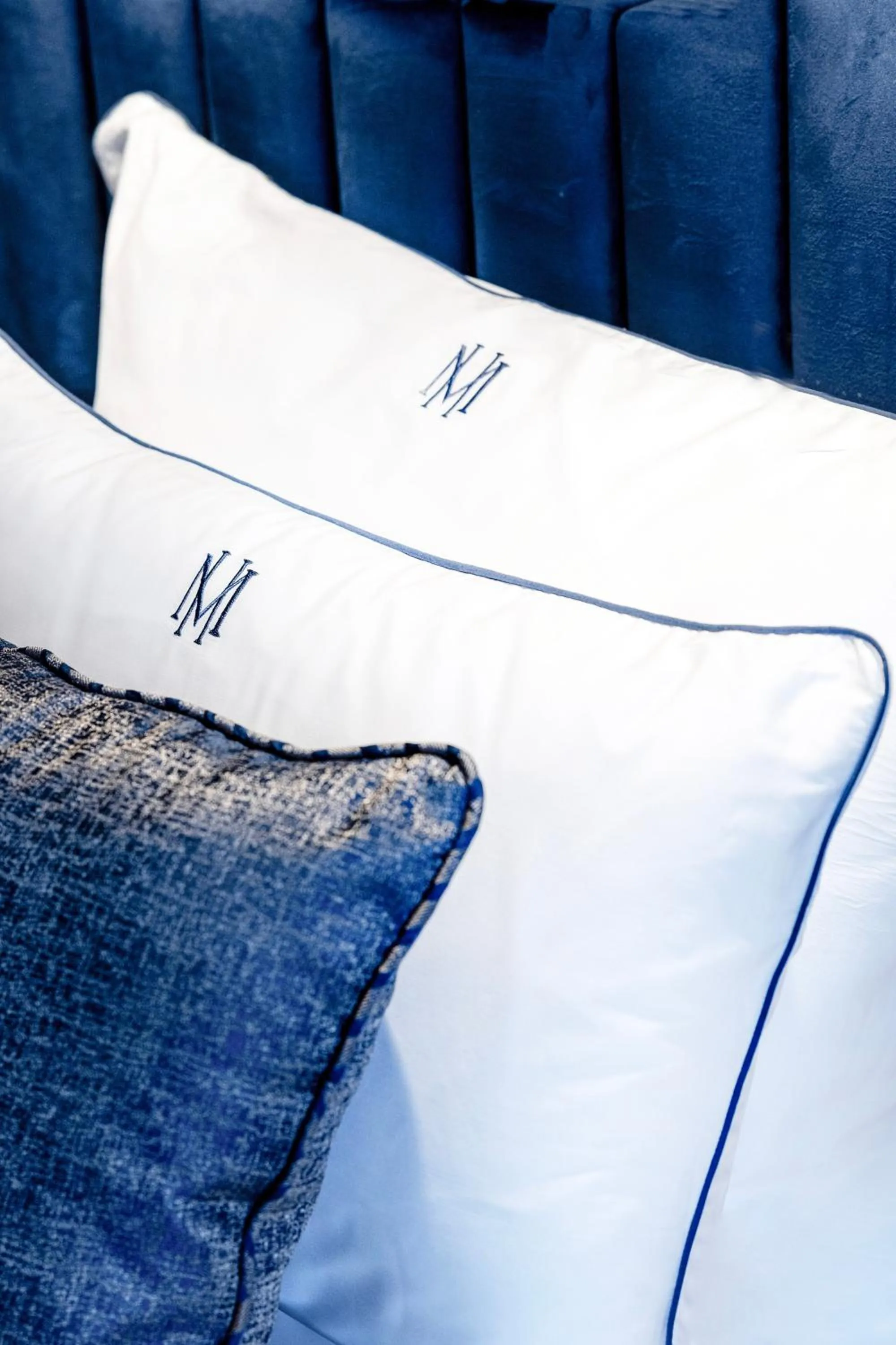 Bed in The Maestro Hotel