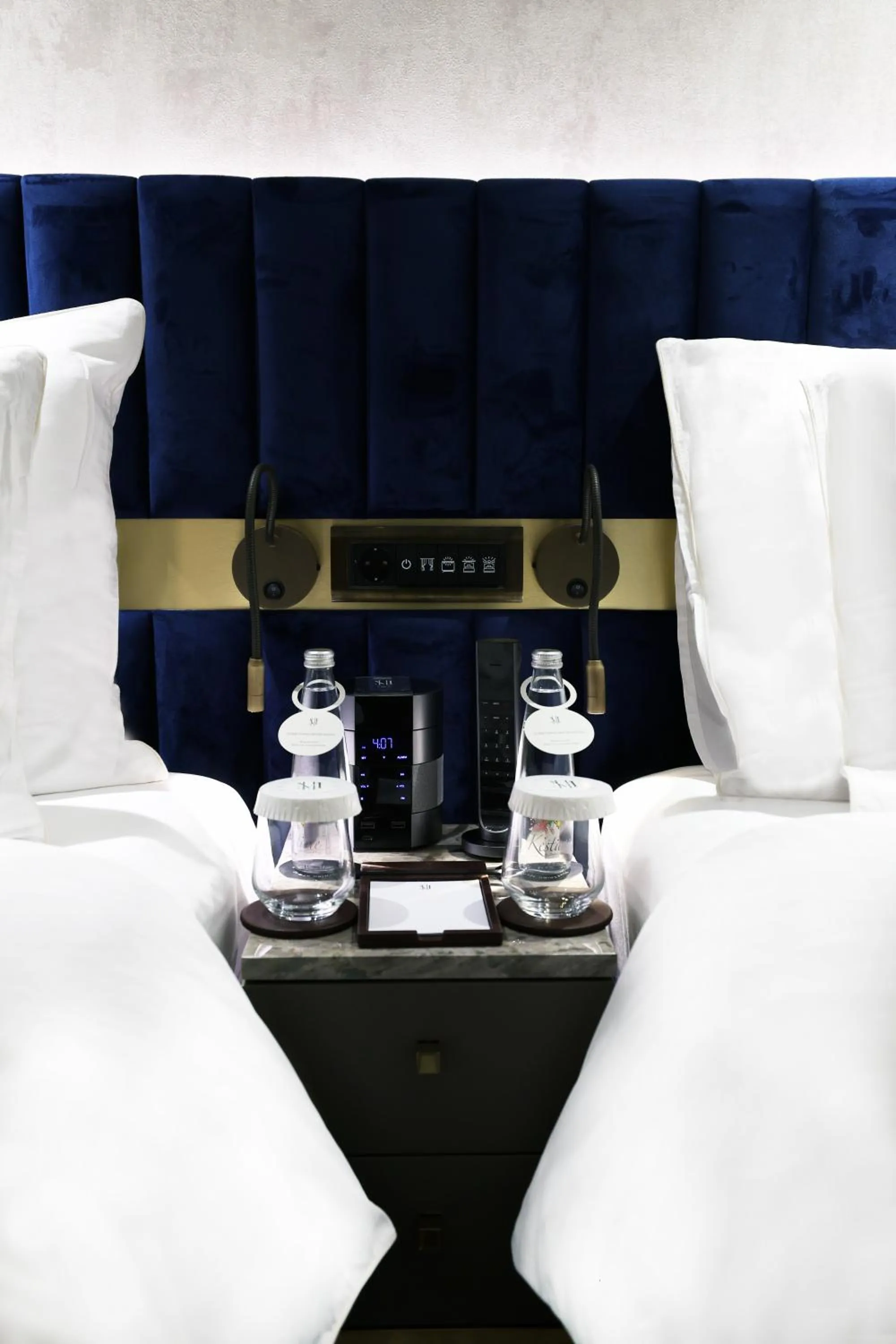 Bed in The Maestro Hotel