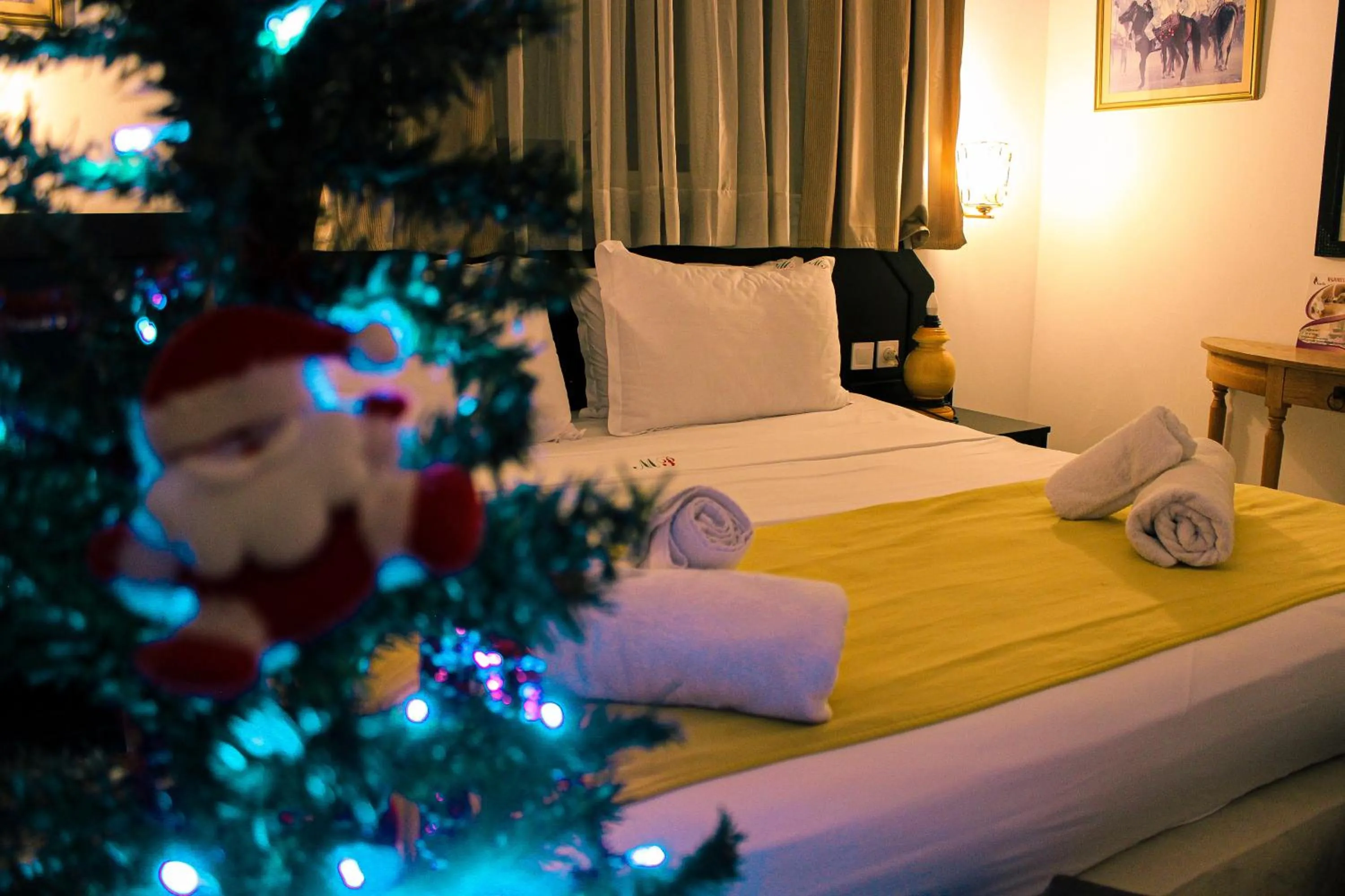 Bed in Majorel Perle Hôtel Riad Restaurant Picine & Spa