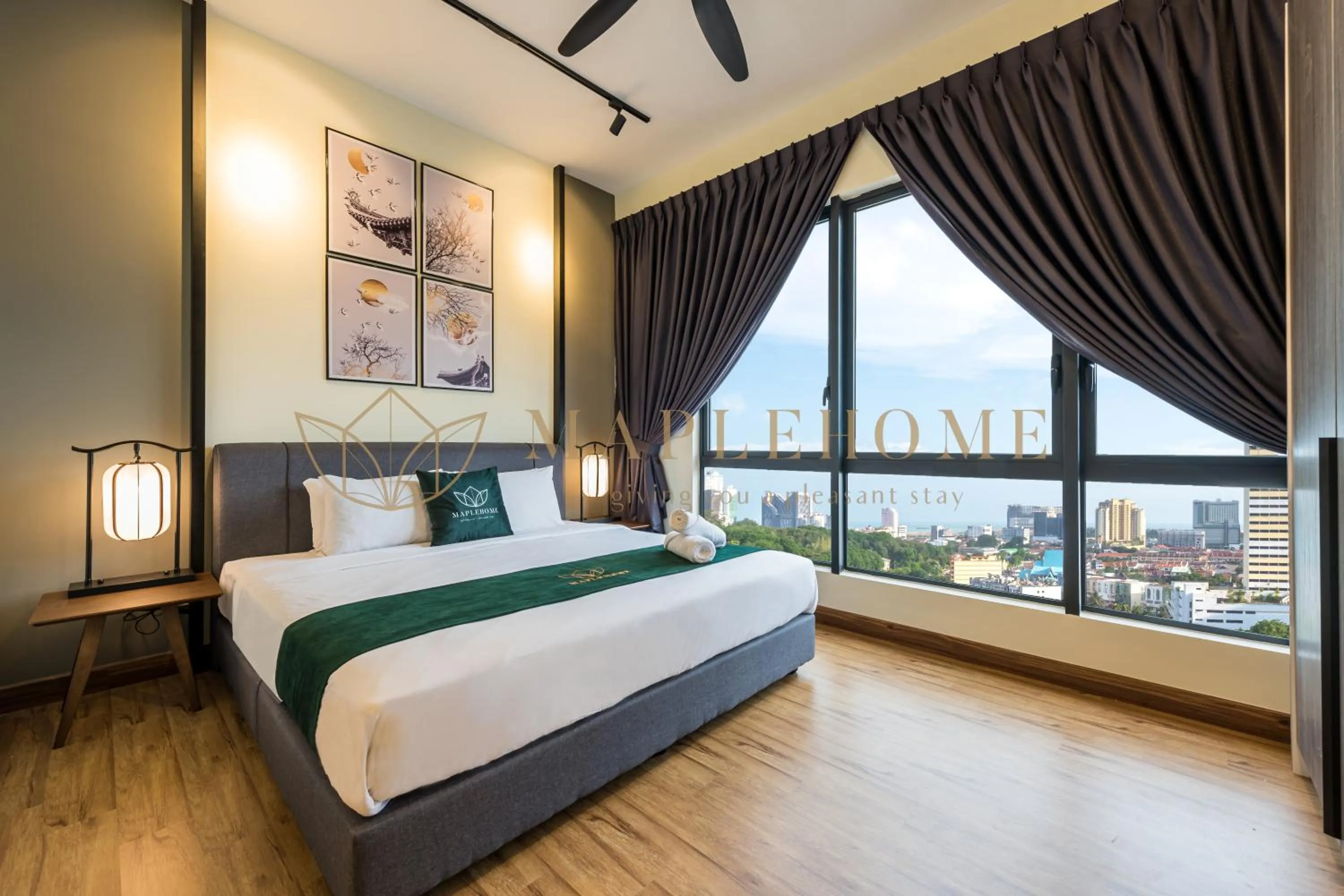 Bed in The Apple Premier Suites Melaka